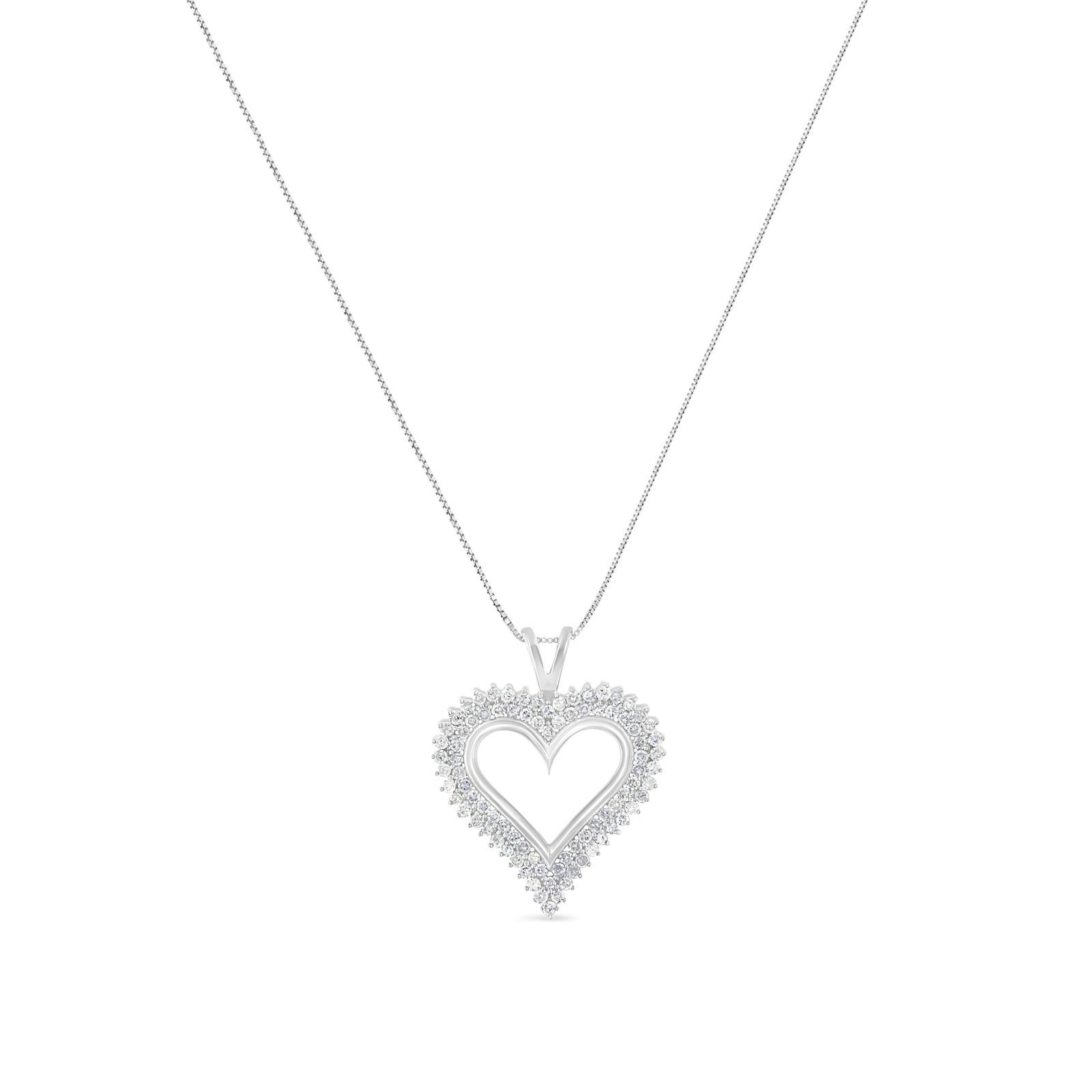Celebrate someone you love with this stunning diamond pendant. This diamond necklace features 2 rows of round diamonds prong set along the edge of this open heart shape crafted of stunning sterling silver, with a matching box chain necklace. Both