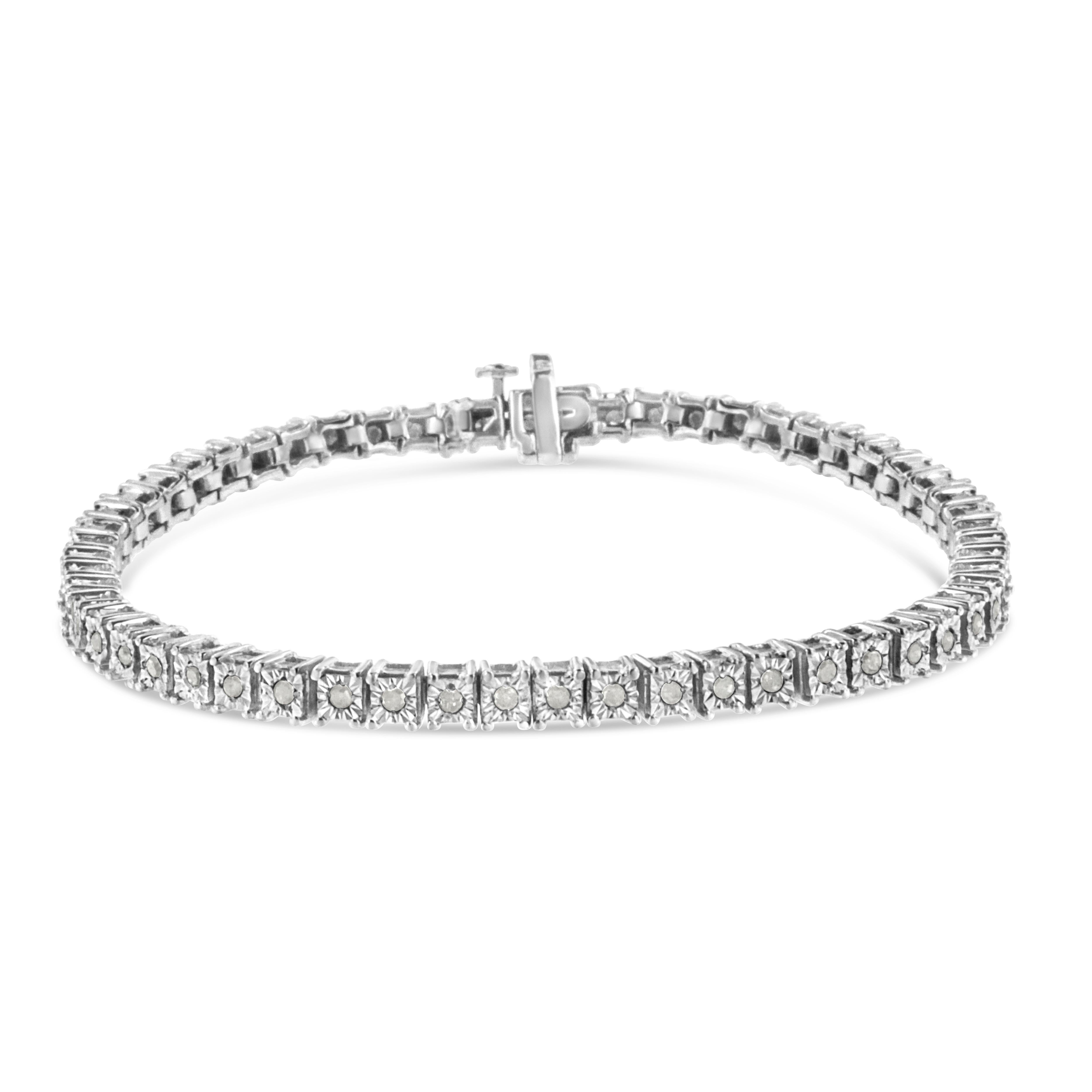 Feminine yet glamorous, this tennis bracelet shines in a polished .925 sterling silver setting. Each link of this tennis diamond bracelet holds a beautiful rose-cut diamond to create a seamless look with 56 stones in total. Give her this bracelet