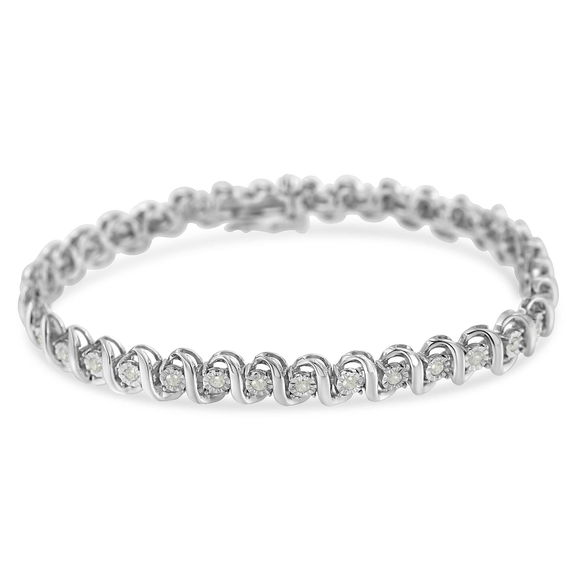 Elegant and timeless, this gorgeous sterling silver tennis bracelet features 1.0 carat total weight of round, miracle set diamonds. The tennis bracelet features S curved links with a single petite genuine round near colorless I-J color diamonds.