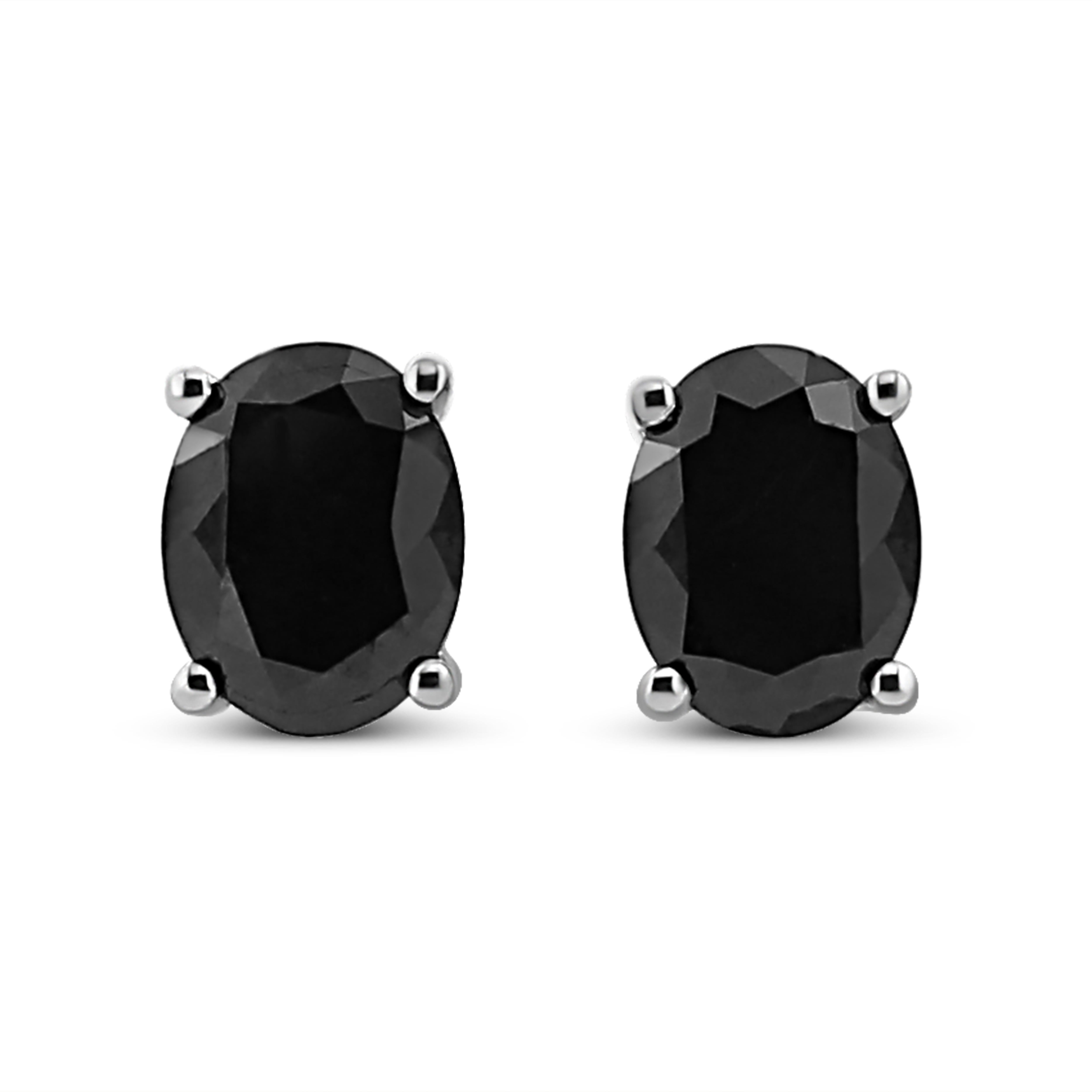 Add this stunningly unique diamond stud earrings to your jewelry collection and impress all your girlfriends. This beautiful pair of treated black studs are made from the finest .925 sterling silver, and is embellished with treated, black oval