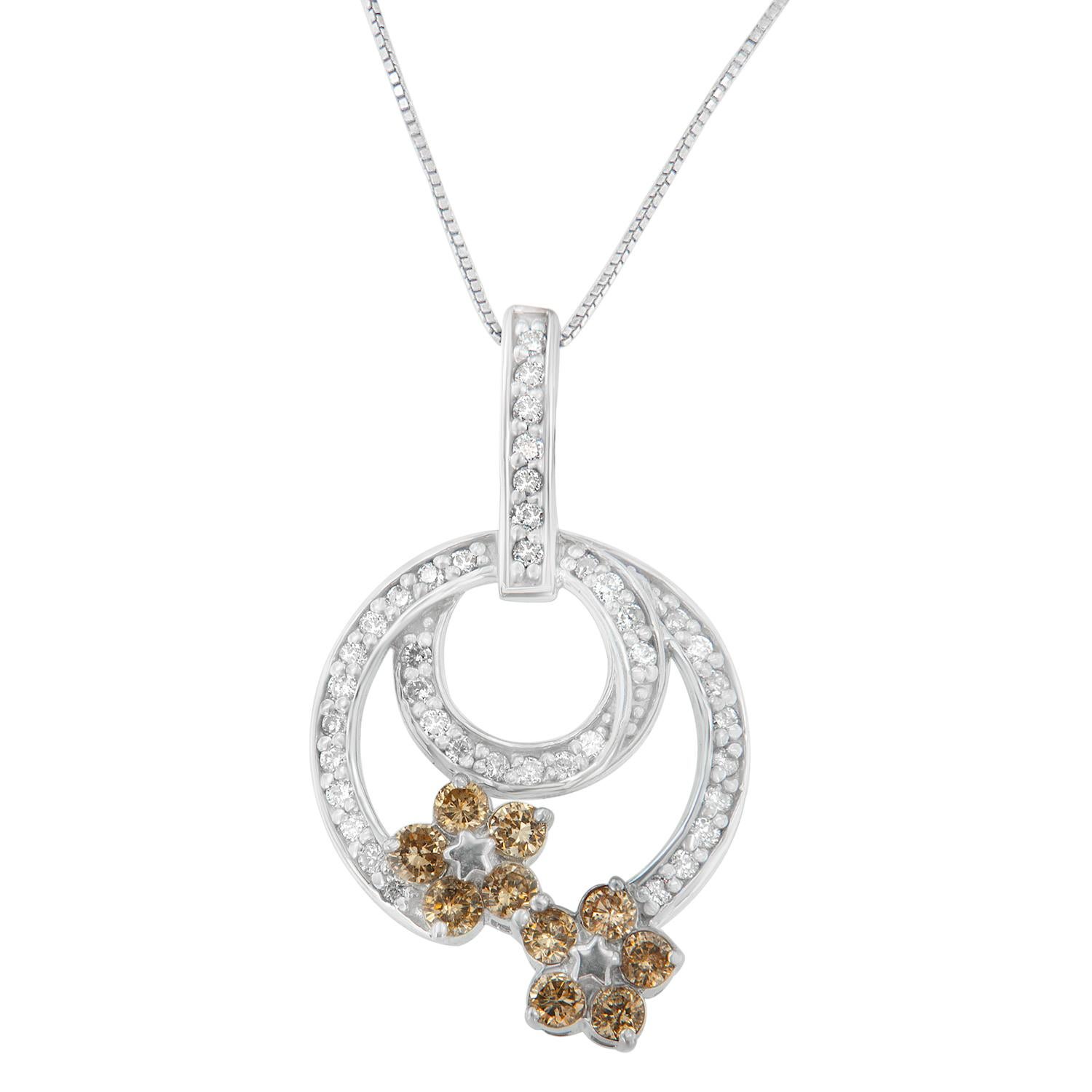  A pair of sweet and stunning Champagne-colored diamond flowers bloom together on this captivating sterling silver pendant. They're both connected to a larger circle of diamonds and accented by an inner circle of diamonds at the center, creating a