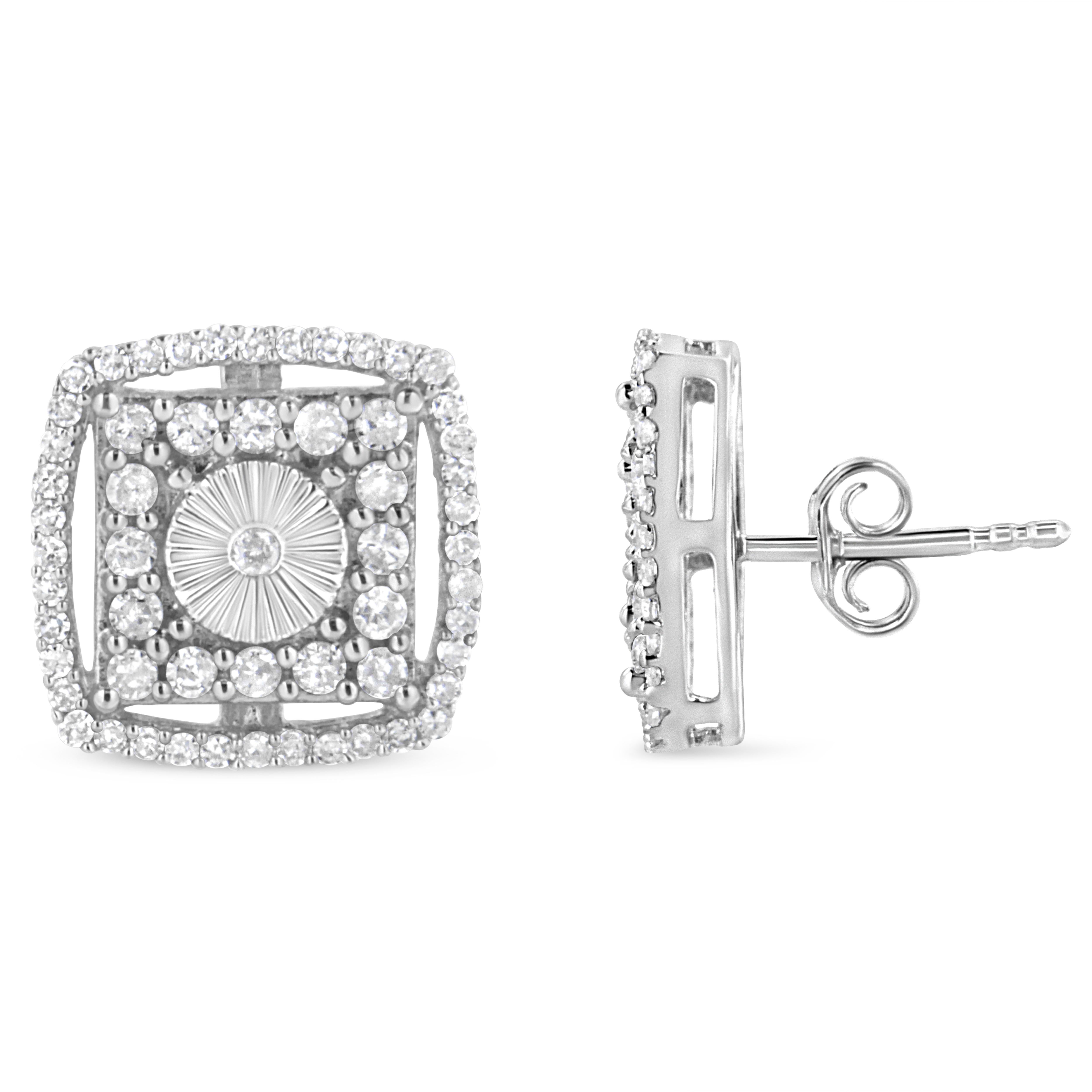These 1.00ct TDW diamond embedded studs are flawlessly made to match the unique personality of every woman who wear them. The beautiful round cut diamond is set on the .925 sterling white silver in a cluster model. And the small round cut diamonds