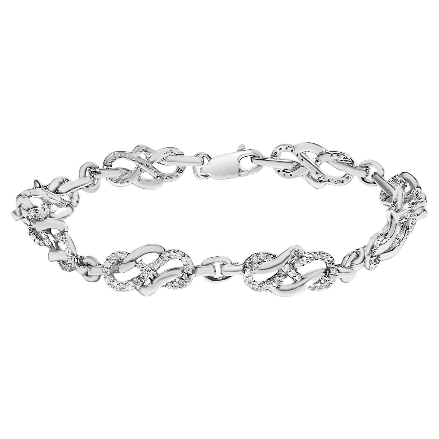 .925 Sterling Silver 1.0 Cttw Diamond Infinity Loop and Swirl Link Bracelet For Sale