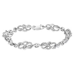.925 Sterling Silver 1.0 Cttw Diamond Infinity Loop and Swirl Link Bracelet