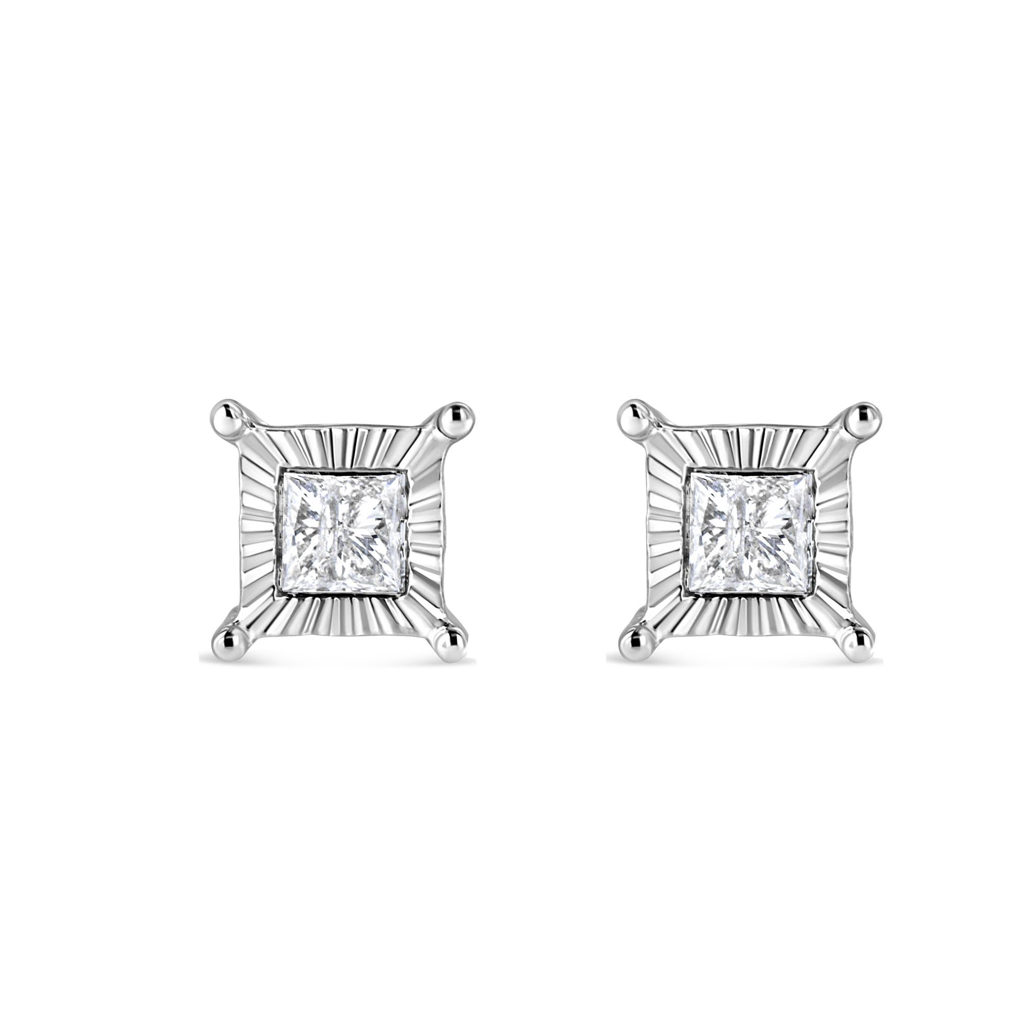 These earrings are a must have for every woman. These fabulous princess cut diamond earrings are crafted in the finest .925 sterling silver, plated with rhodium (a platinum-family metal) for a lifetime of tarnish-free wear. Each stud showcases a