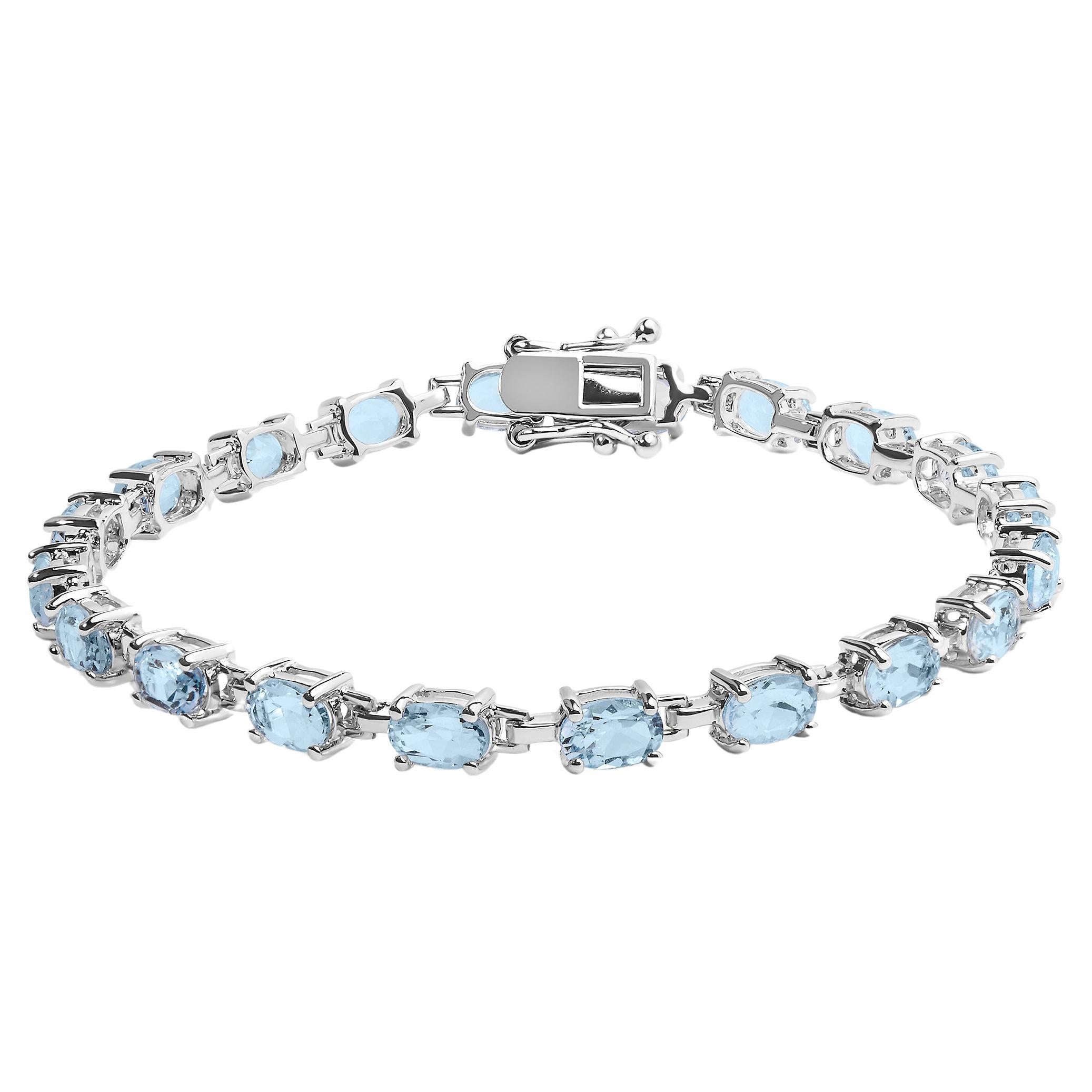 .925 Sterling Silver 11.0 Carat Created Light Blue Topaz Link Bracelet For Sale