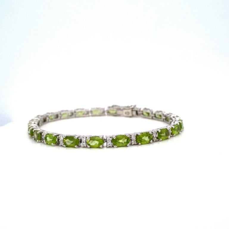 Beautifully handcrafted silver 13.35 Carat Peridot Diamond Tennis Bracelet for Mom, designed with love, including handpicked luxury gemstones for each designer piece. Grab the spotlight with this exquisitely crafted piece. Inlaid with natural