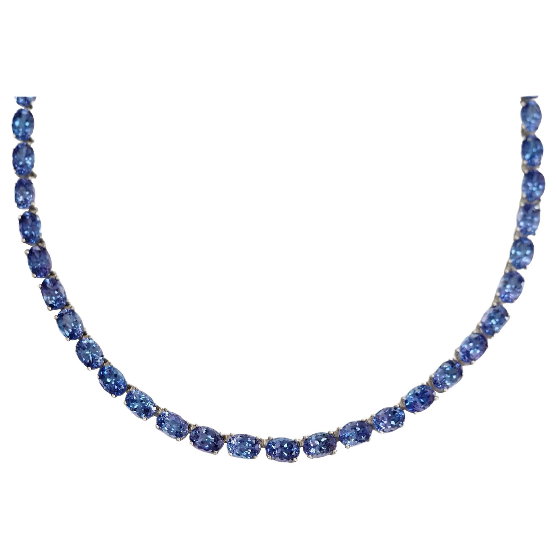 925 Sterling Silver 14 Karat Yellow Gold 60 Carat Blue Tanzanite Necklace For Sale