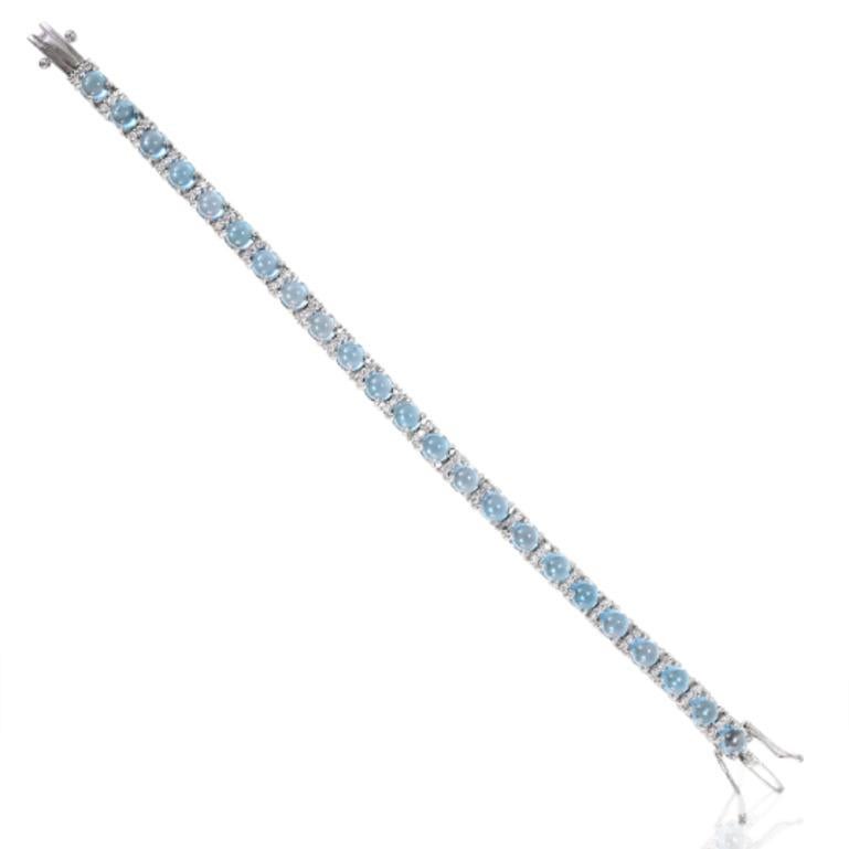 Modern 925 Sterling Silver 14.49 Carat Blue Topaz and Diamond Tennis Bracelet For Sale