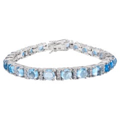 925 Sterling Silver 14.49 Carat Blue Topaz and Diamond Tennis Bracelet
