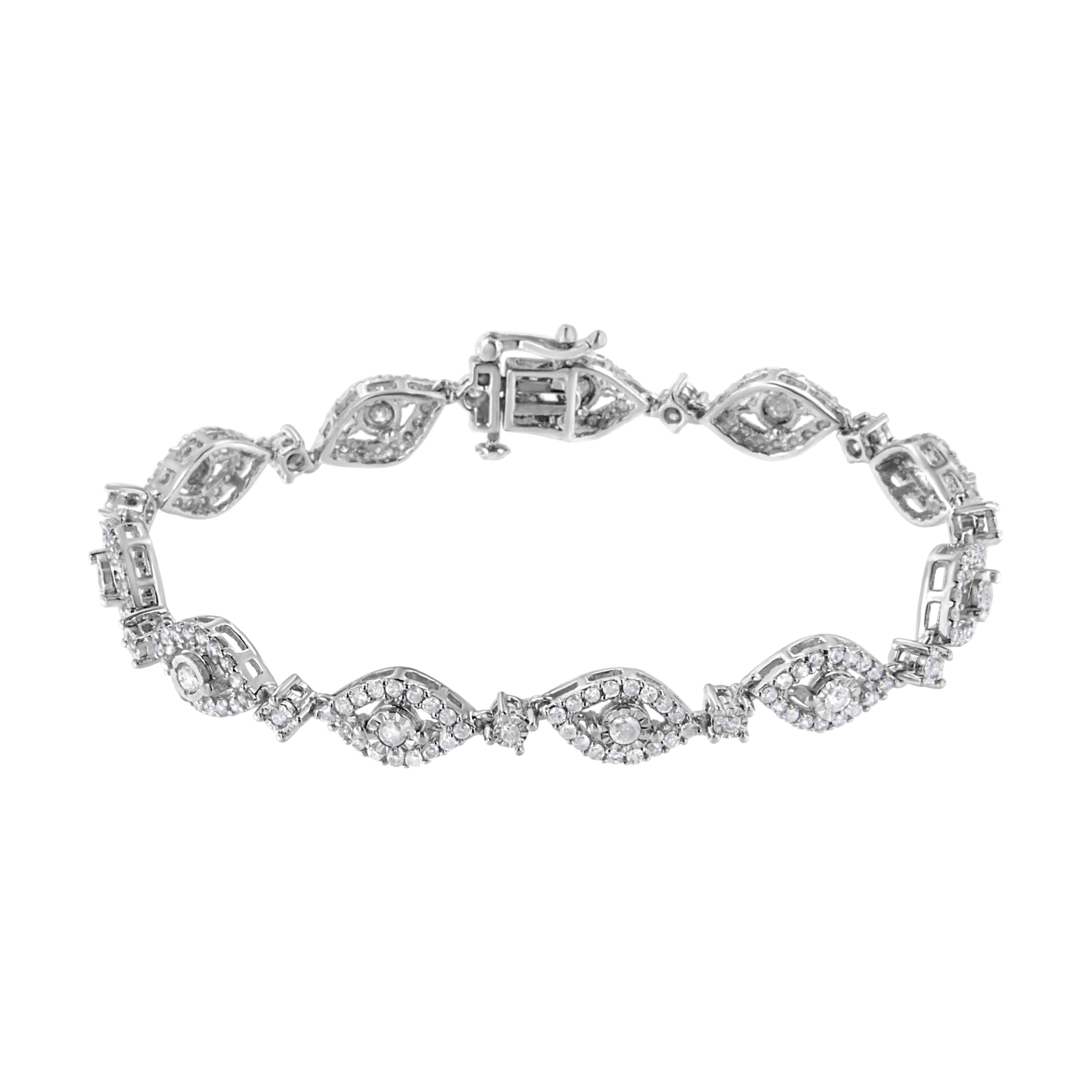 Let yourself be dazzled by this genuine .925 sterling silver link bracelet that showcases 2 1/2ct TDW of diamonds. 198 round cut diamonds glisten in this stunning design. A miracle set round cut diamond sits at the heart of each diamond inlaid