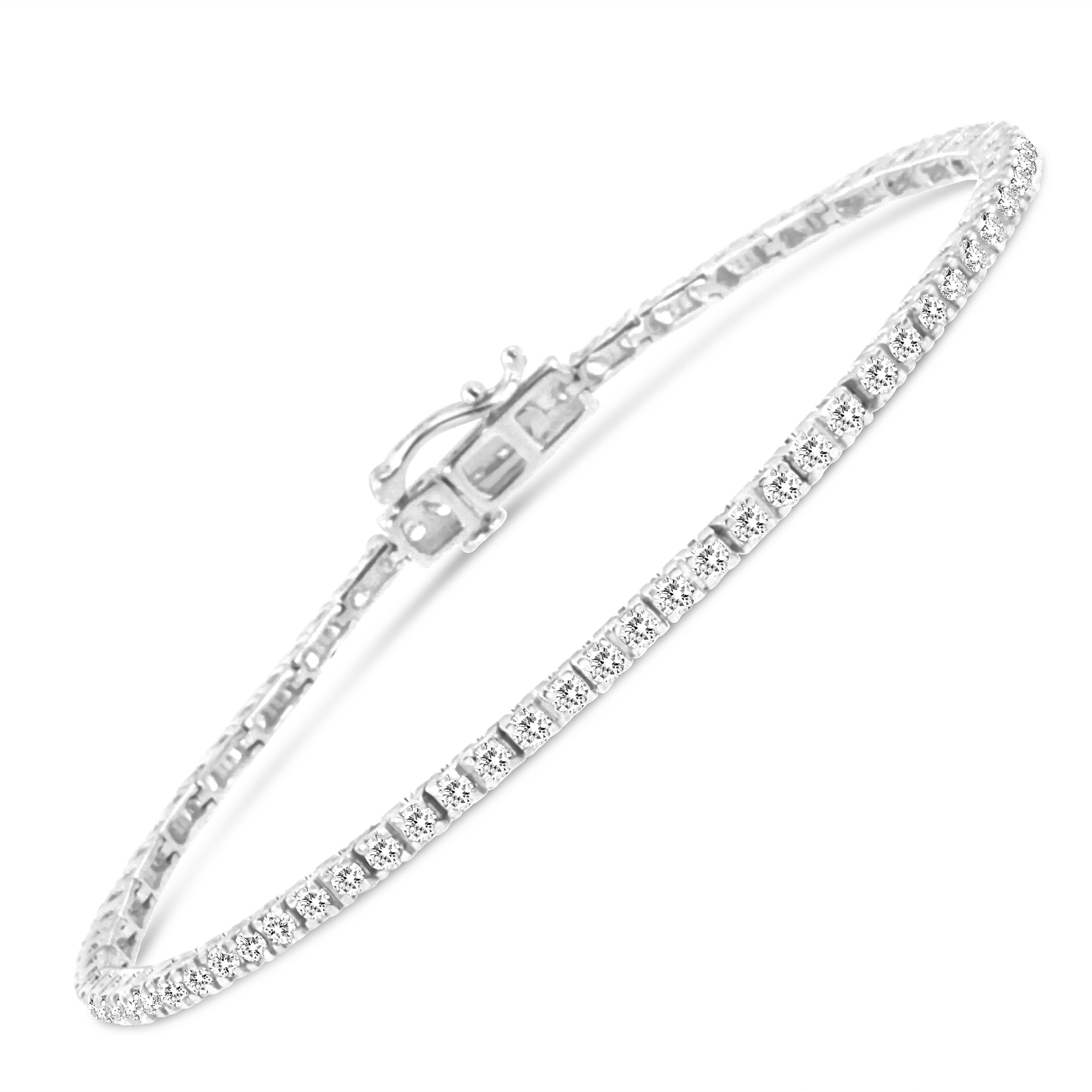 Elegant and timeless, this gorgeous 92.5% sterling silver tennis bracelet features 2.0 carat total weight of natural round brilliant cut white diamonds with a whopping 78 individual stones in all. The tennis bracelet has hinged links consisting of