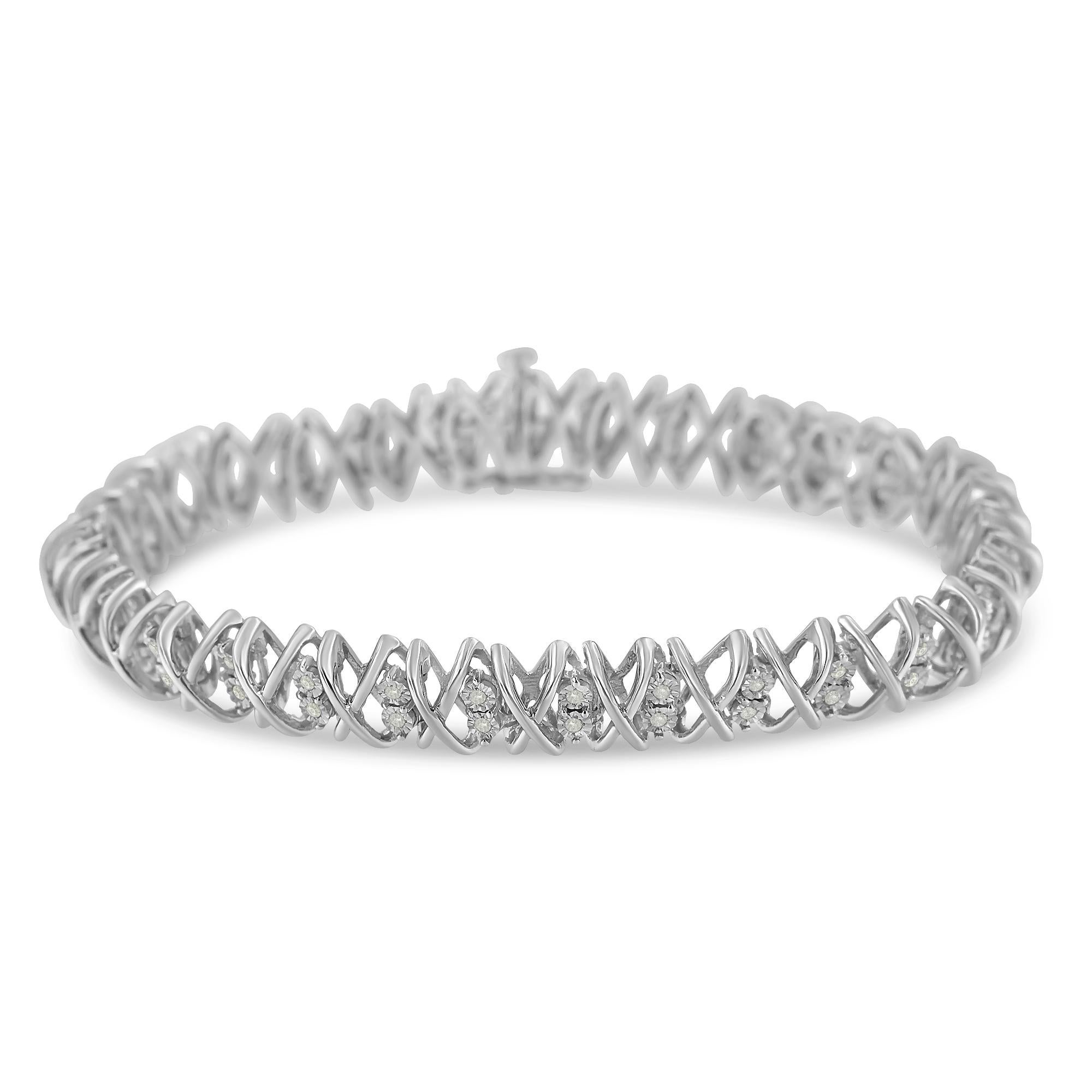 Unique in design and meticulously crafted, this x-link diamond bracelet is a classic addition to your growing jewelry collection. Made from the finest .925 sterling silver and embellished with 56 diamonds, this piece is sure to illuminate her wrist.