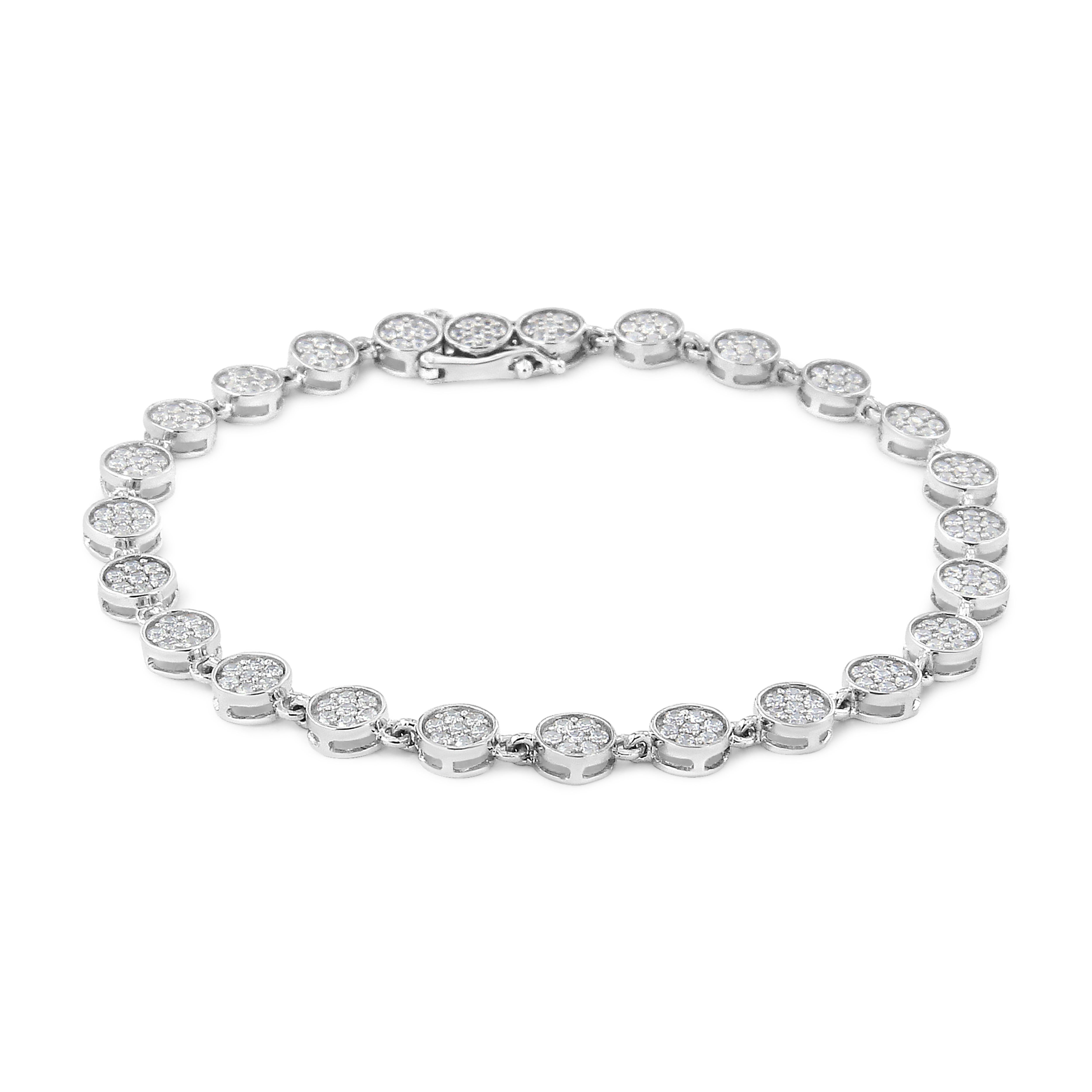 Flash effortless beauty with this stylish diamond link bracelet. This sterling silver diamond link bracelet presents the same striking allure as your favorite little black dress, but with a sparkling twist. Accentuated with 175 diamonds, this piece