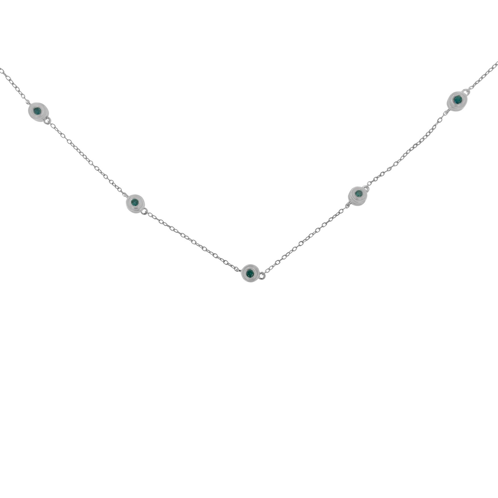 Add a touch of elegance to your outfit with this charming diamond yard necklace. Created in the finest 0.925 sterling silver, this piece is treated with 14 sparkling, round-cut diamonds in a bezel setting. The treated blue diamonds add a bit of