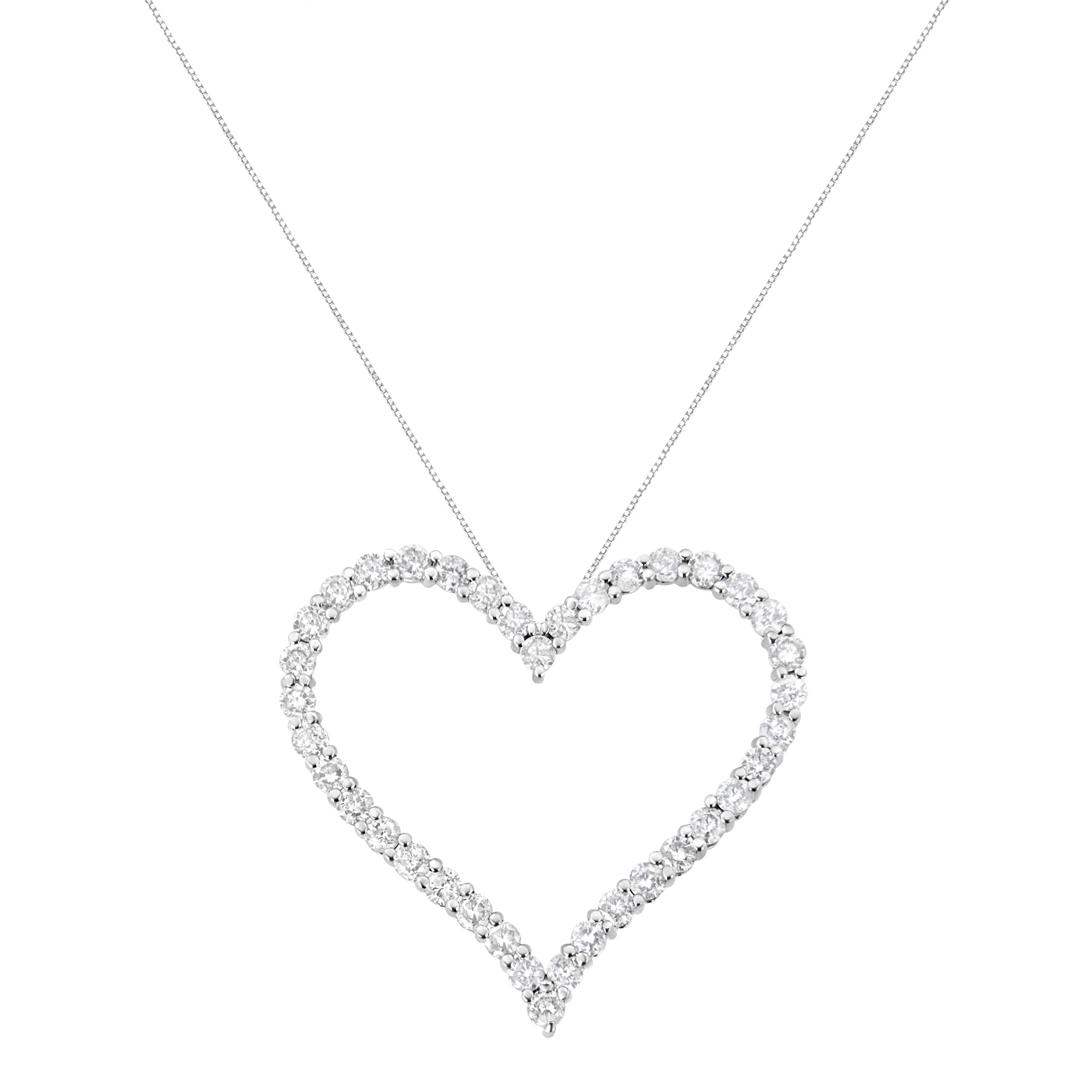 A single rows of natural, sparkling diamonds are set in cool .925 sterling silver gold to create a stunning open heart design in this beautiful pendant necklace for her. This pendant has 38 round diamonds, that are I2-I3 in clarity and I-J in color;