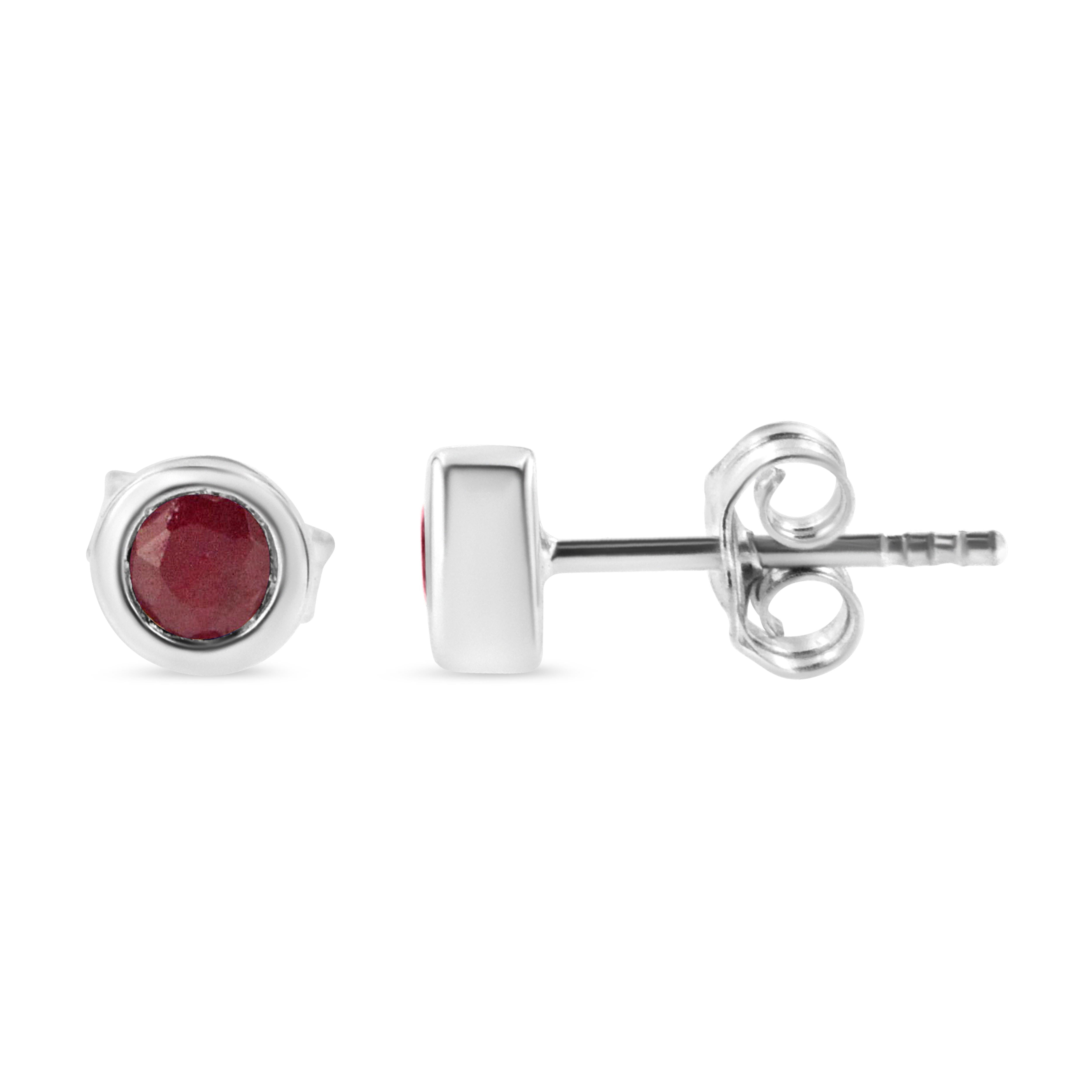 Striking and timeless, these stunning .925 sterling silver solitaire stud earrings feature bold garnet gemstones in a bezel setting. The gemstones are 3.5mm and treated red in color. The notched posts and friction backs keep these pierced earrings