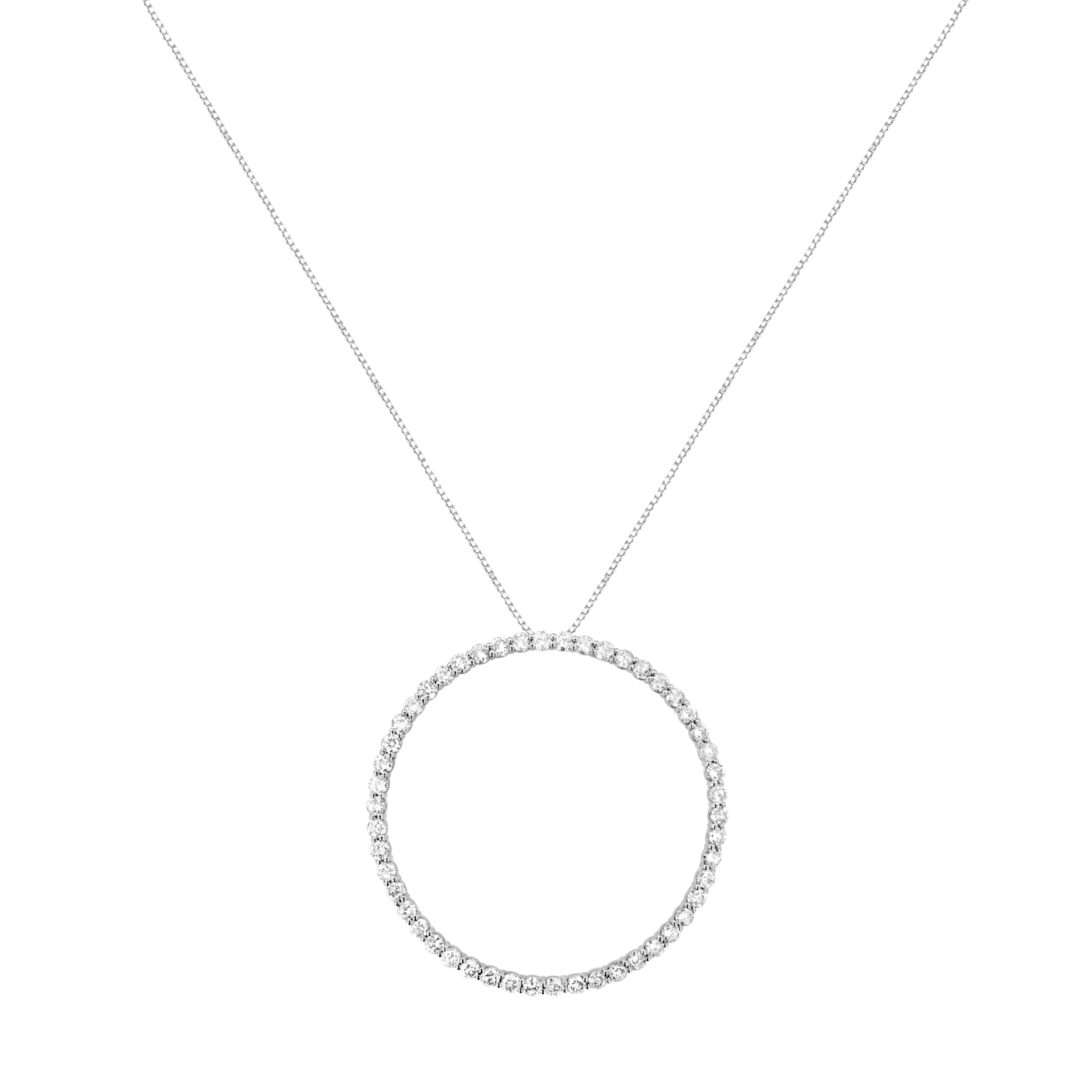 You can't go wrong with this simple and delicate circle pendant necklace. Crafted in cool sterling silver, this pendant features 4ct TDW of diamonds. 50 glistening round cut diamonds line this open circle pendant that dangles from a rope chain and