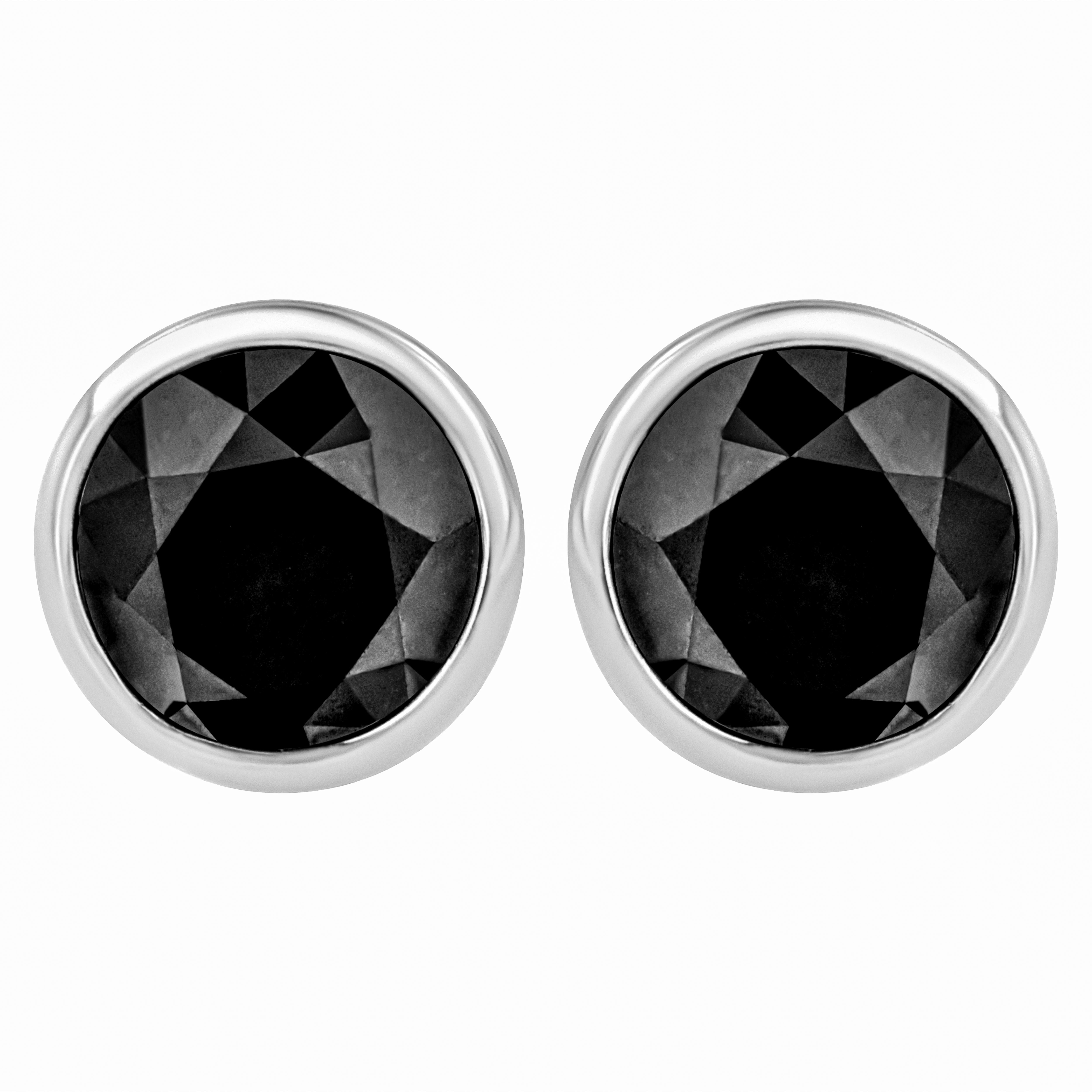 Elegant and timeless, these gorgeous .925 sterling silver solitaire stud earrings feature bold and beautiful heat treated, color enhanced black diamonds in a bezel setting. The earrings feature screwback closures. The notched posts and friction