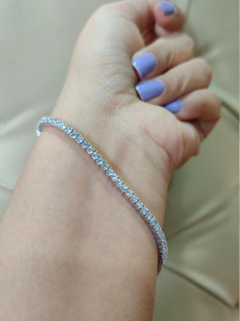 5.94 Carat Round Cubic Zirconia Engagement Tennis Bracelet in sterling silver. You shall need statement tennis bracelet to make a statement with your look. Each piece features dazzling cubic zirconia stones, renowned for their brilliance and