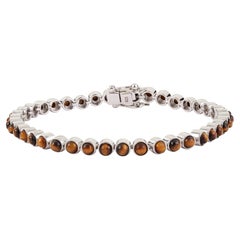 Bracciale tennis delicato in argento sterling 925 con occhio di tigre da 5,96 carati di Silvorra