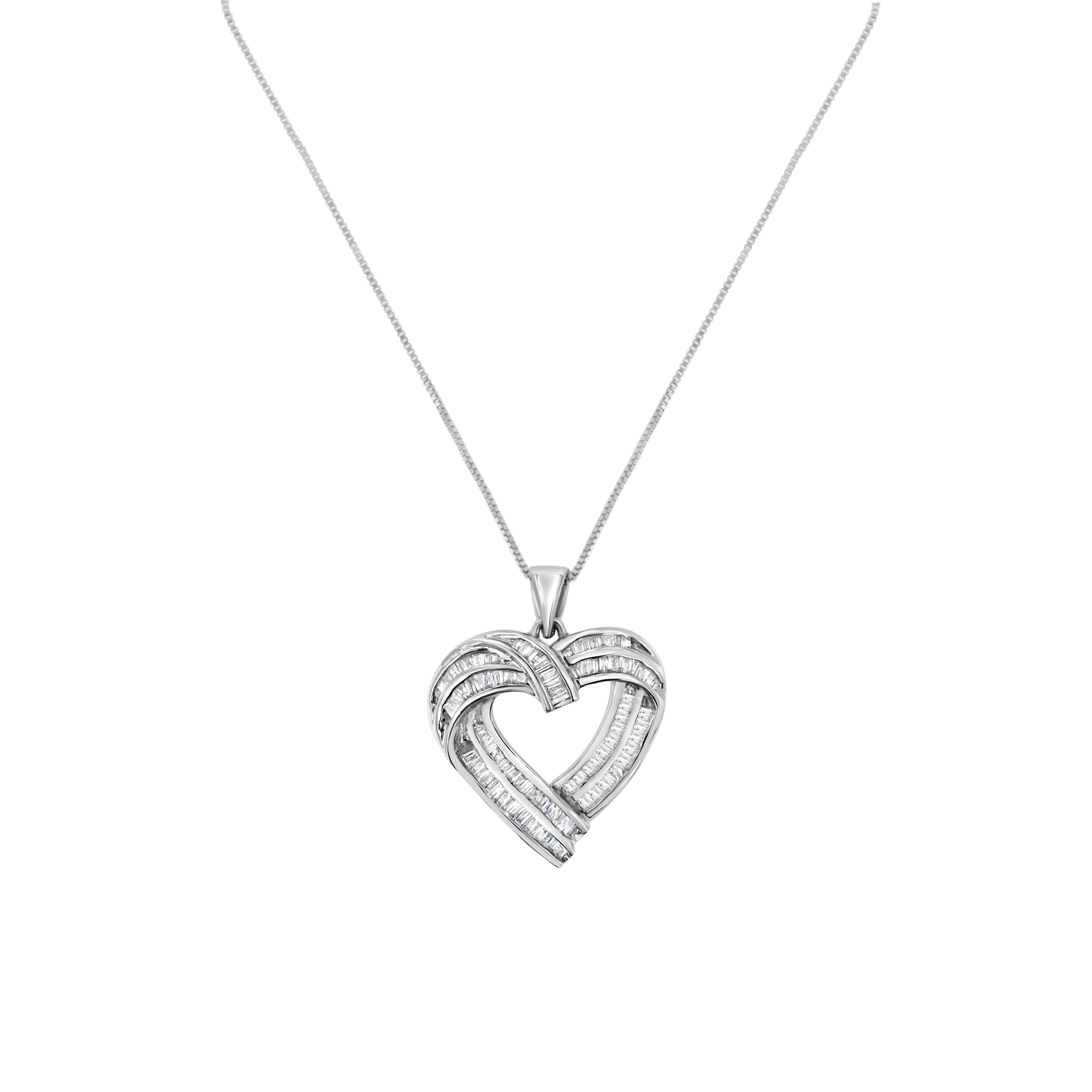 A stunning heart pendant necklace with an interlocking sterling silver design boasting beautiful baguette-cut diamonds. Embellished in a channel setting, this pendant has a total diamond weight of 7/8 carats. This is the perfect accessory for