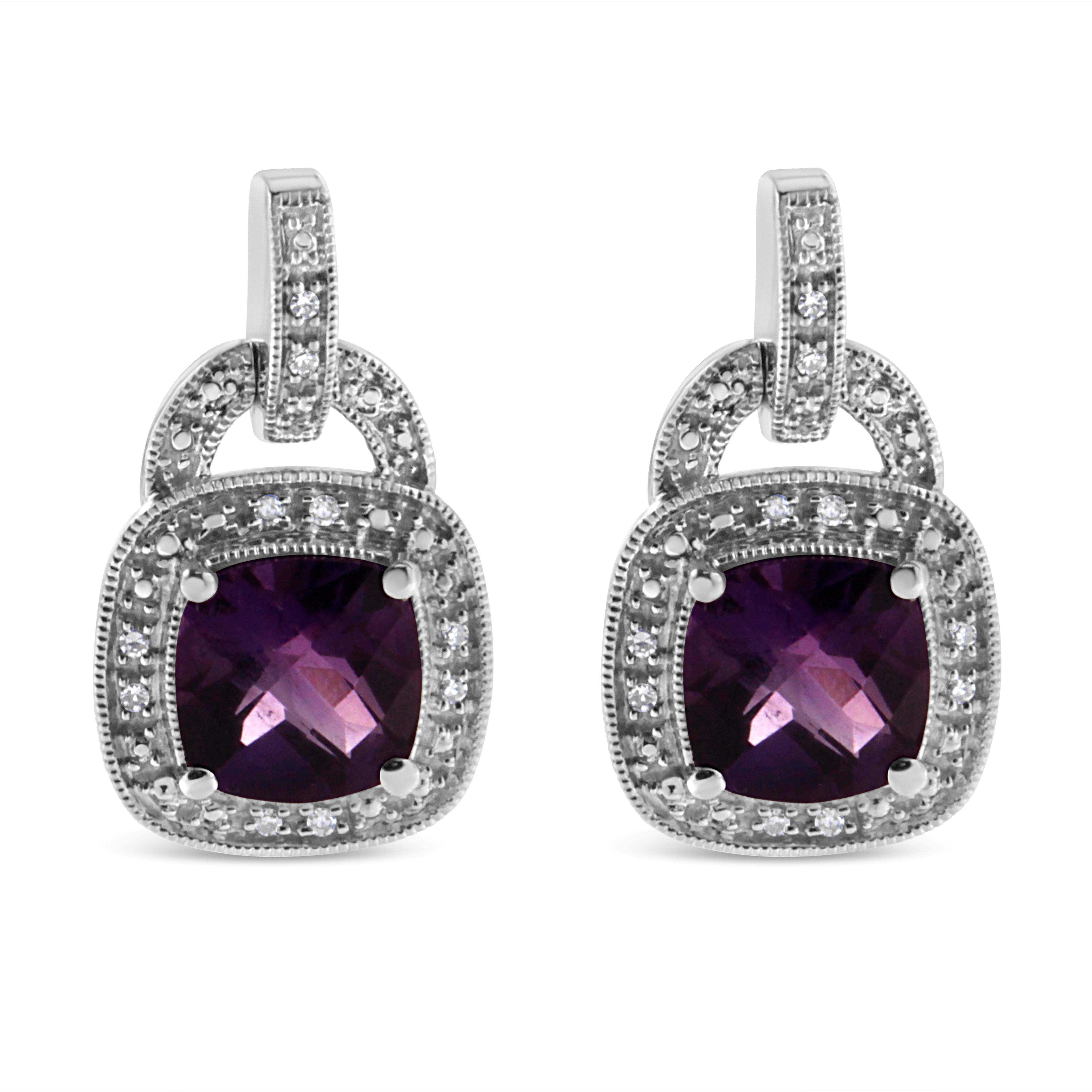 Beautifully express your love for her with these radiant amethyst and diamond earrings. Crafted in luminous sterling silver these earrings features 2 centrally staged 8MM cushion cut amethyst that are gracefully complemented by 20 sparkling single