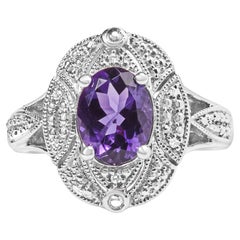 .925 Sterling Silver 9x7mm Oval Purple Amethyst and Diamond Cocktail Ring