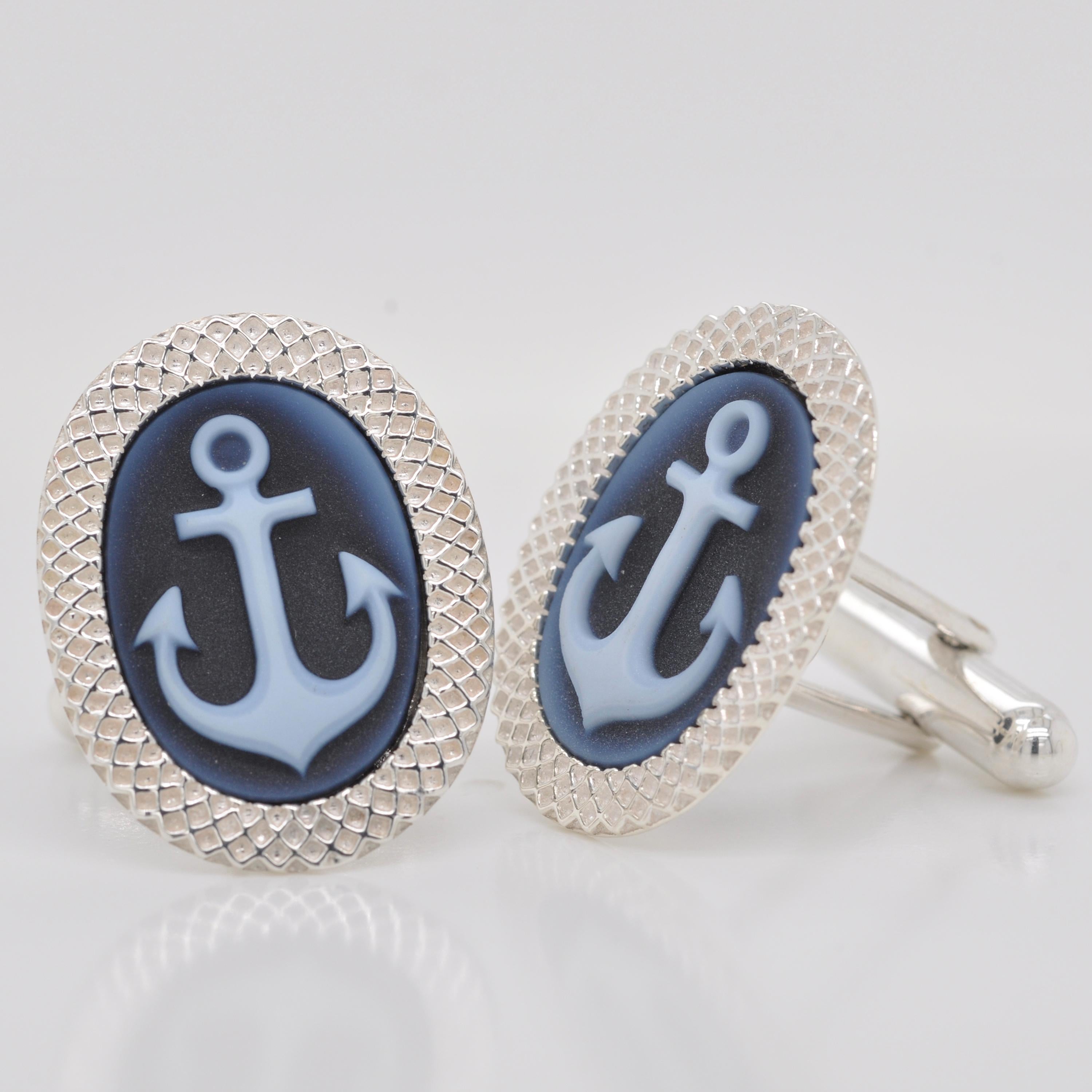 925 sterling silver anchor agate cameo carving cufflinks

These high quality cufflinks exhibit extremely high quality of craftsmanship. On the relief of Natural agate, the anchor is carved outside for a three dimensional effect. The remarkable level