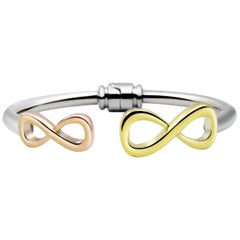 .925 Sterling Silver and 14 Karat Gold Vermeil Infinity Mixed Hinge Bracelet