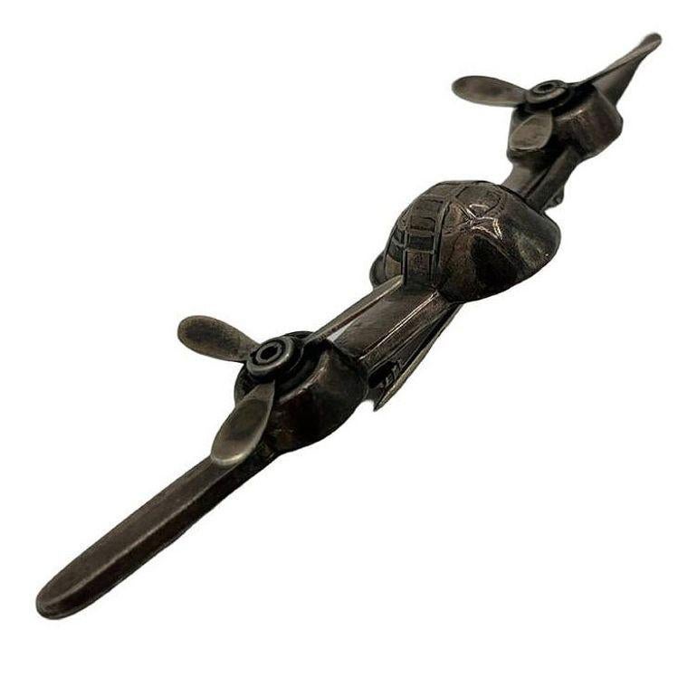 Vintage B-25 Mitchell bomber brooch with moving propeller props made from 925 sterling silver. The back of the pin-locking clasp and is signed 