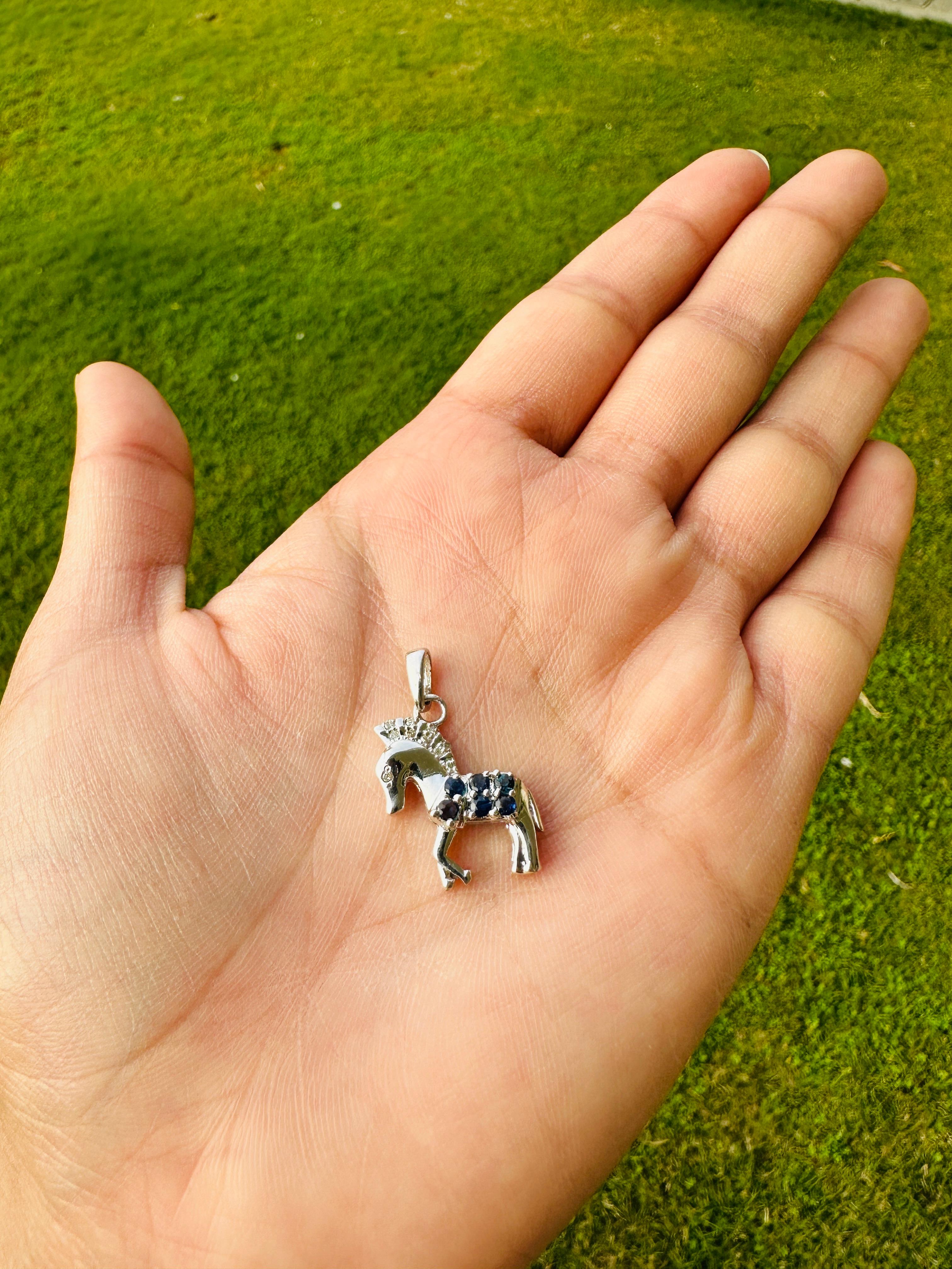 This Blue Sapphire Diamond Horse Pendant Unisex Gifts is meticulously crafted from the finest materials and adorned with stunning blue sapphire which helps in relieving stress, anxiety and depression.
This delicate to statement pendants, suits every