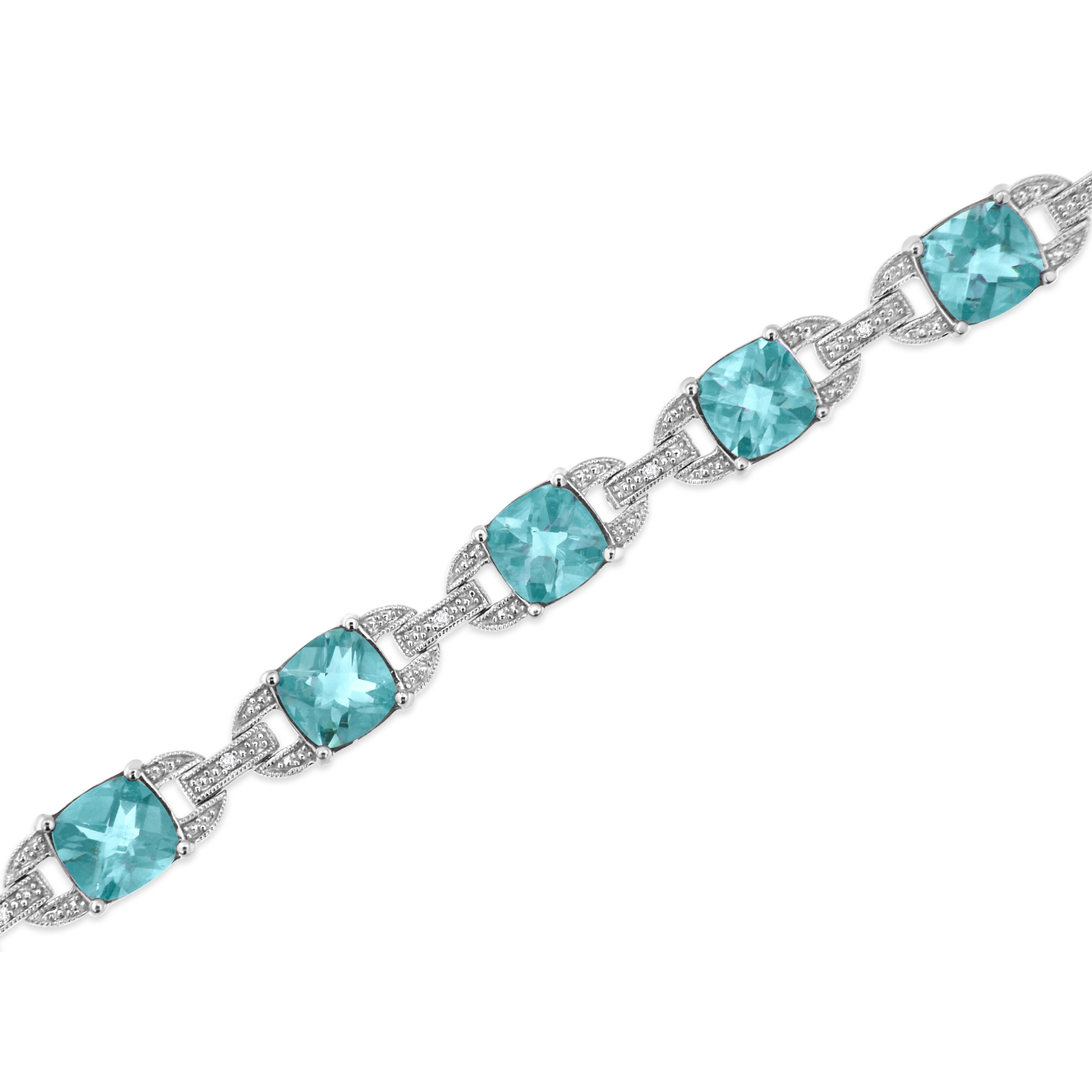 Contemporary .925 Sterling Silver Blue Topaz and 1/20 Carat Diamond Fashion Tennis Bracelet For Sale