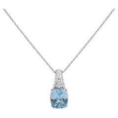 Collana con ciondolo testurizzato in argento .925, topazio blu e diamanti