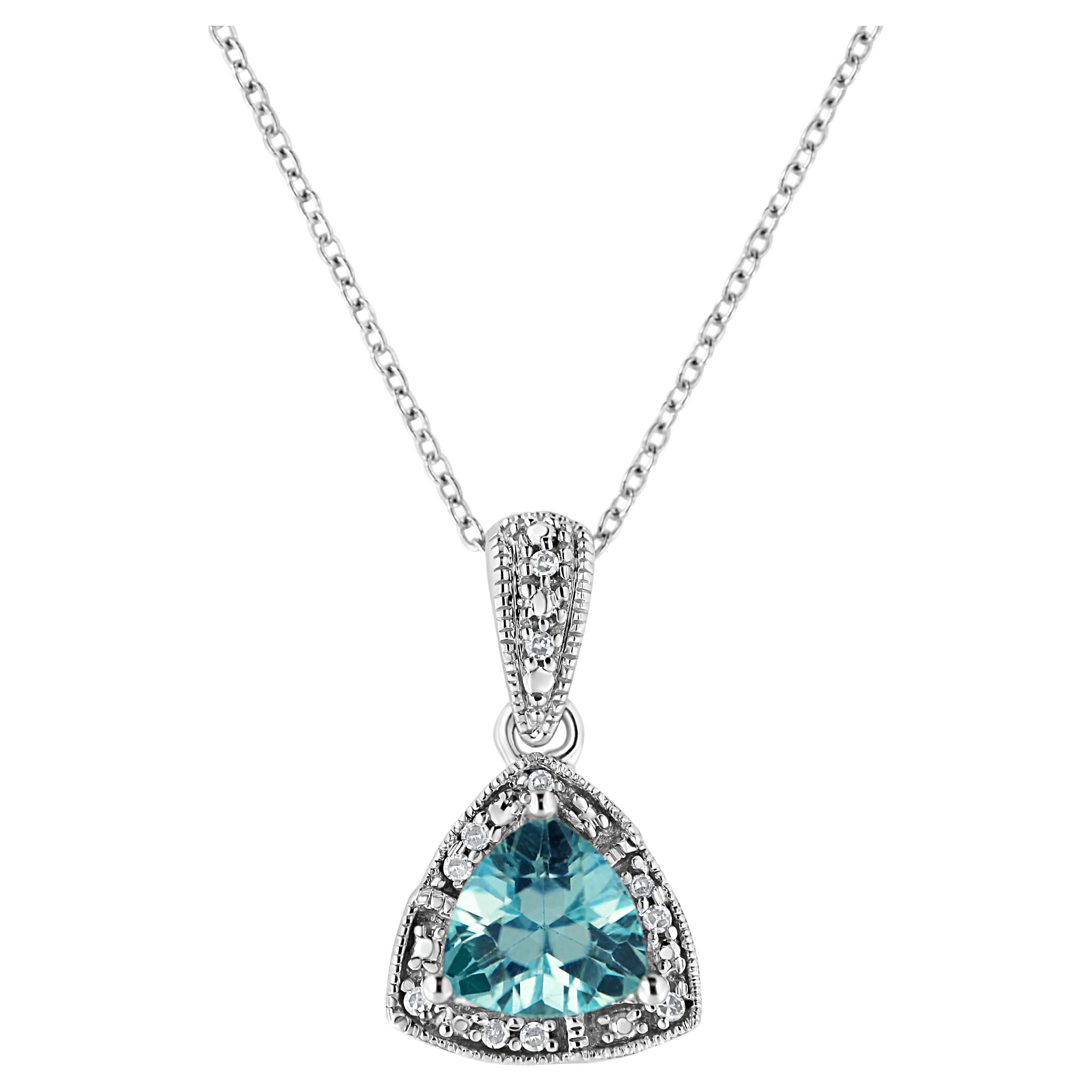 .925 Sterling Silver Blue Topaz Gemstone and Diamond Accent Pendant Necklace For Sale