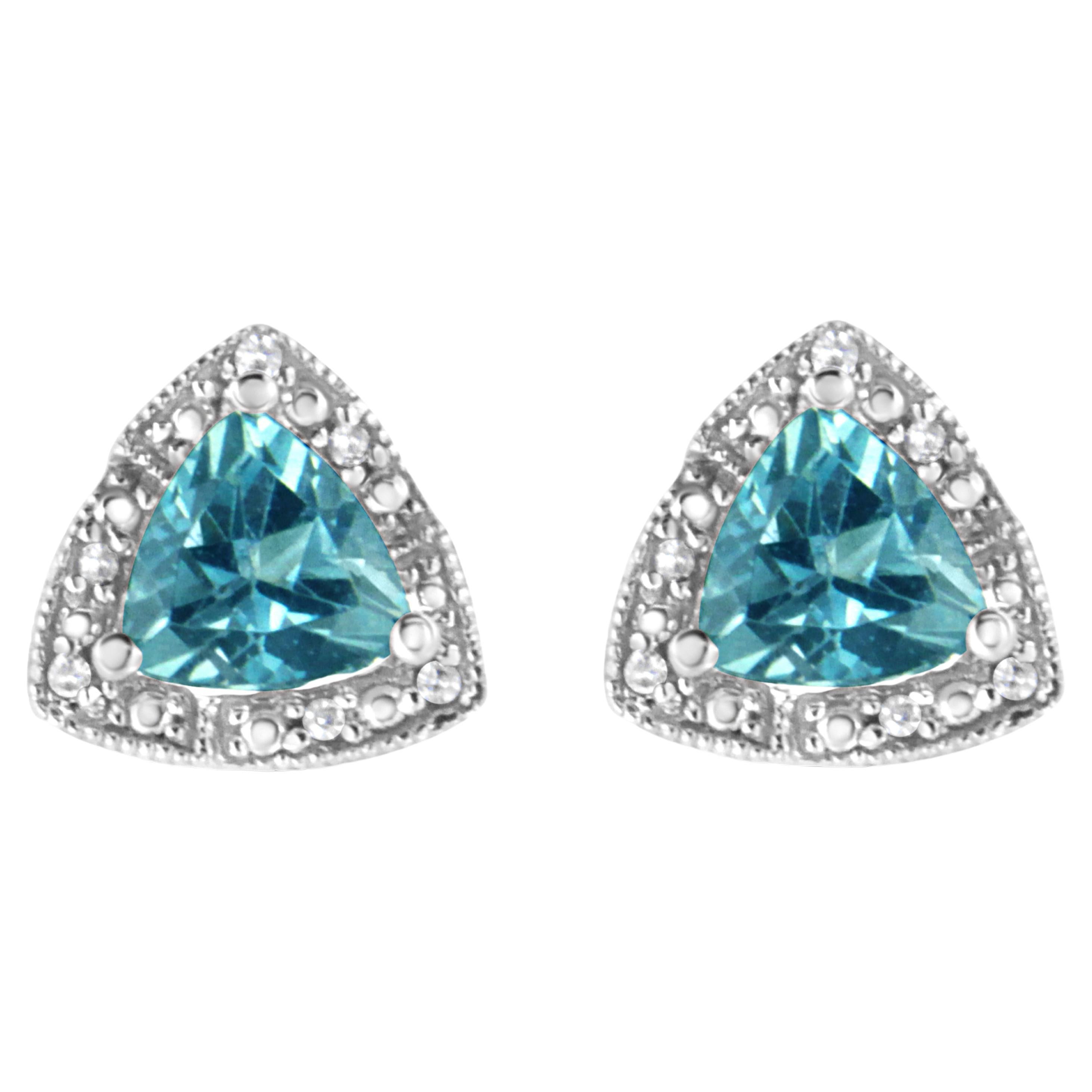 .925 Sterling Silver Blue Topaz Gemstone and Diamond Accent Stud Earring For Sale