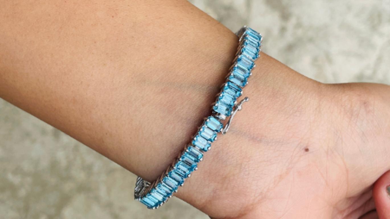 Taille baguette Bracelet tennis pour mariage en argent sterling avec topaze bleue de .925 en vente