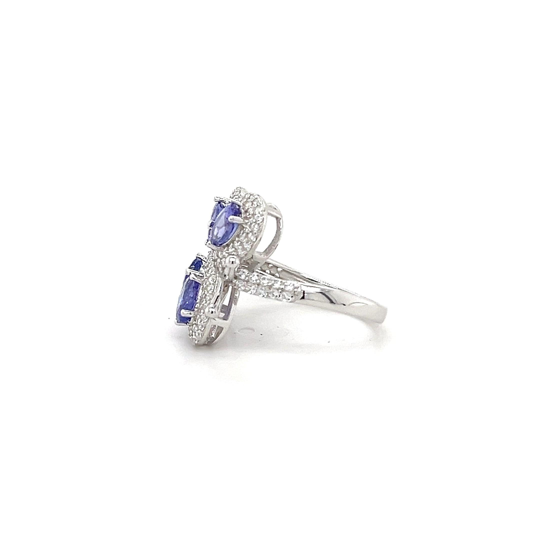 Anillo de mariposa de plata de ley 925 para mujer Anillo de tanzanita del mes de diciembre Corte oval en venta