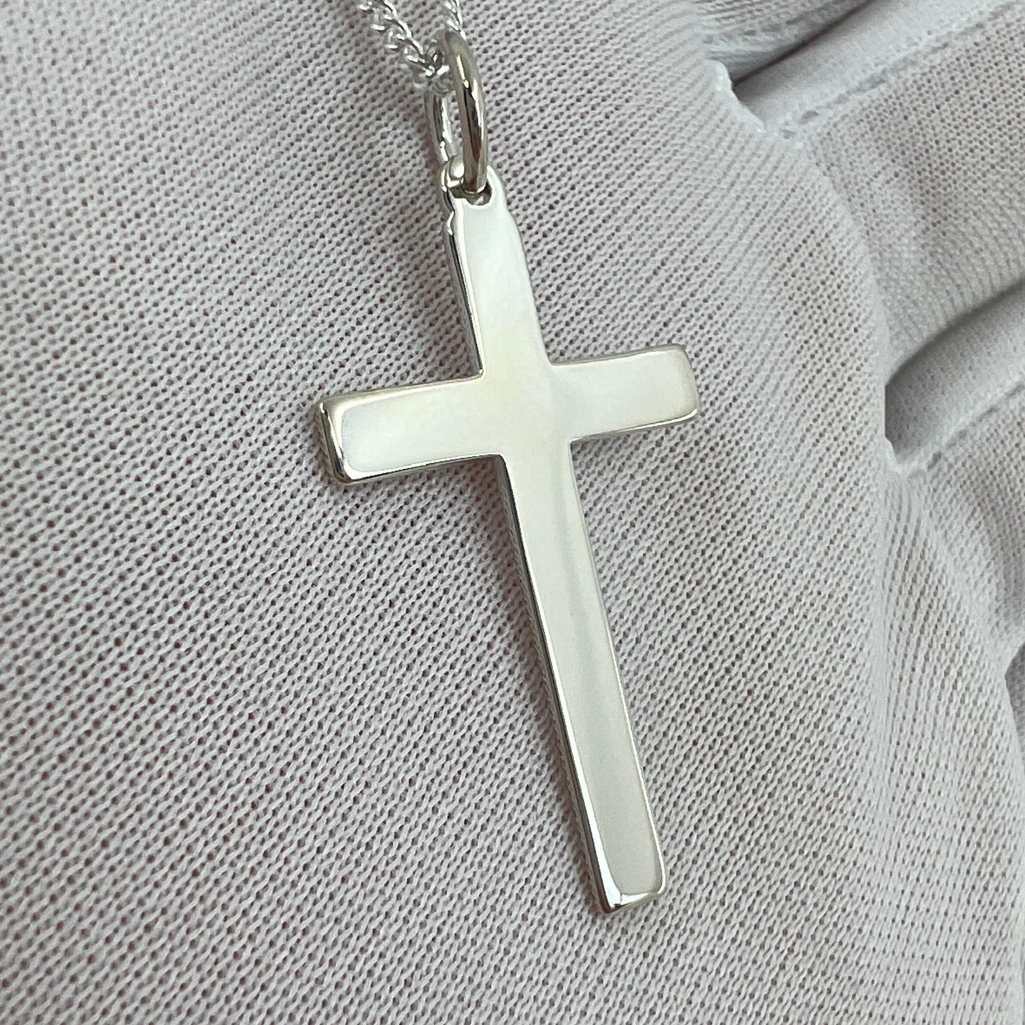 Brand new 925 Sterling Silver Cross Pendant Necklace.

Beautiful 32x18mm cross pendant weighing 1.54g hanging on an 18' (45cm) curb chain.

Brand new and never worn. 

Cross an chain together weigh 4.2g.

All our jewellery is posted safely and