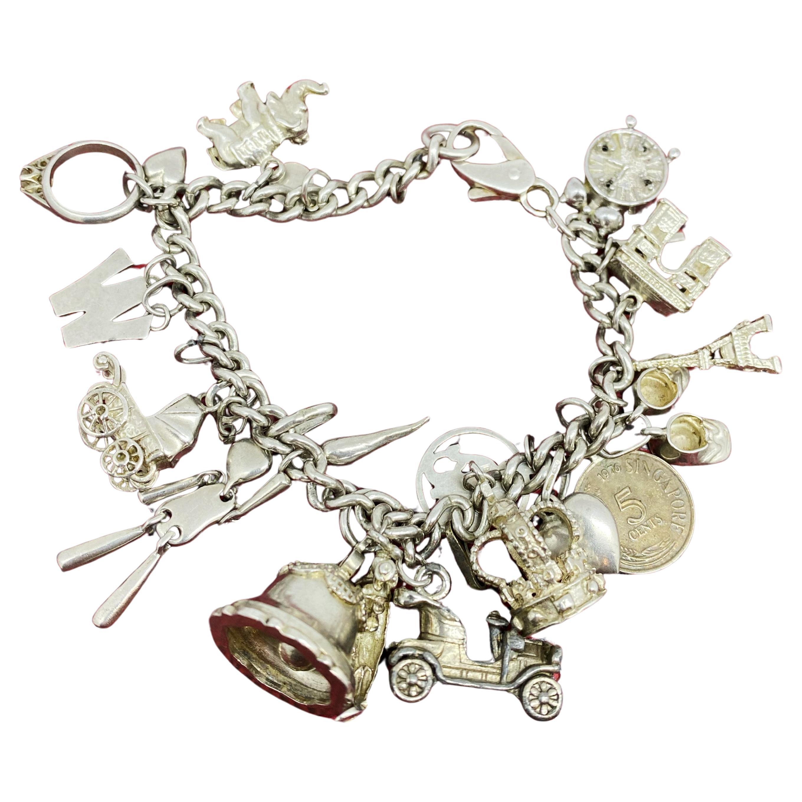 925 Sterling Silver Curb Link Vintage Charm Bracelet with 20 Charms. 59.6gr.