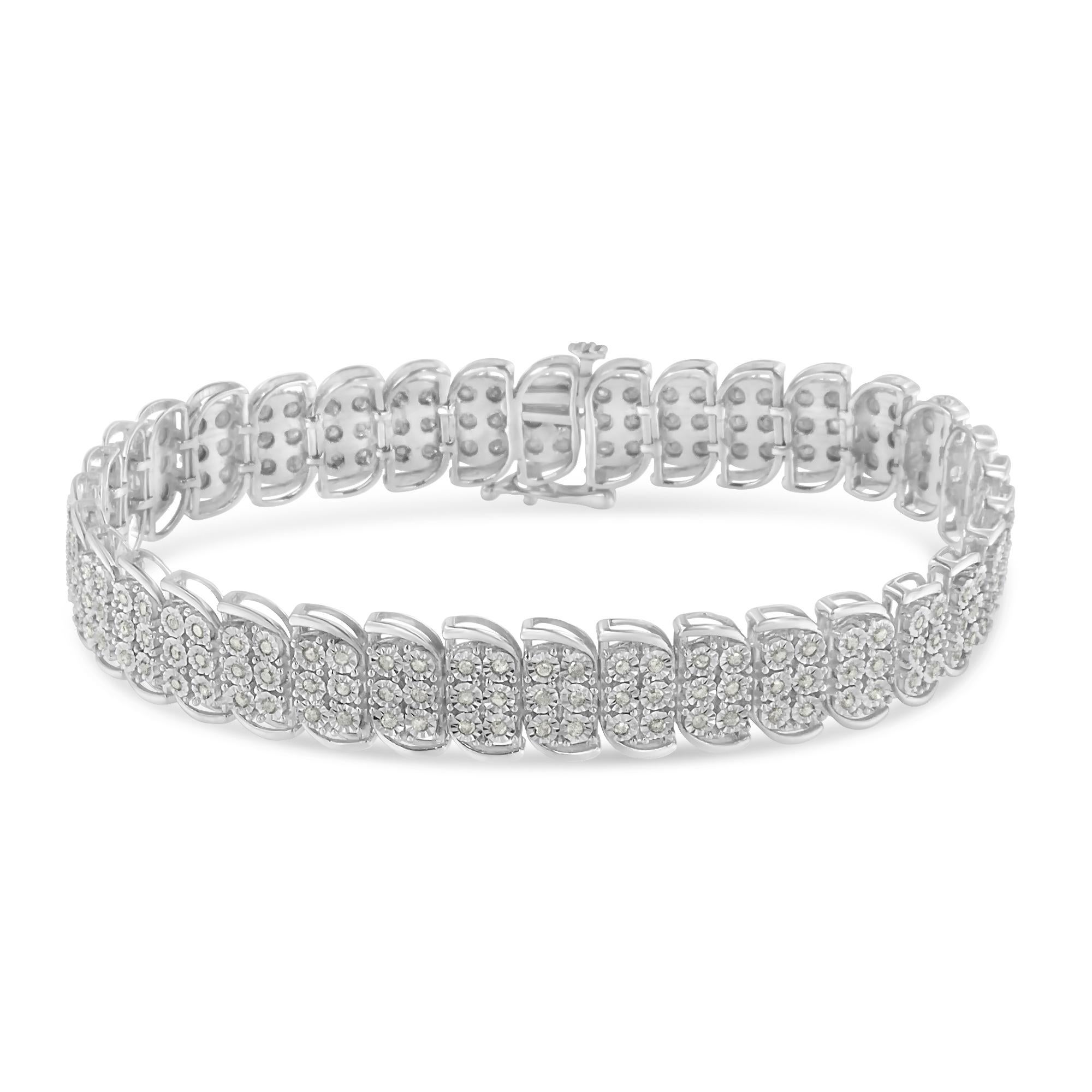Illuminate her wrist with this stunning s-link bracelet. Crafted from the finest .925 sterling silver, this piece is embellished with 210 diamonds in a miracle setting. Weighing a total diamond weight of 2 carats, this bracelet is the perfect