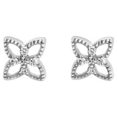 Orecchino con diamante in argento 925 con 4 petali di fiore