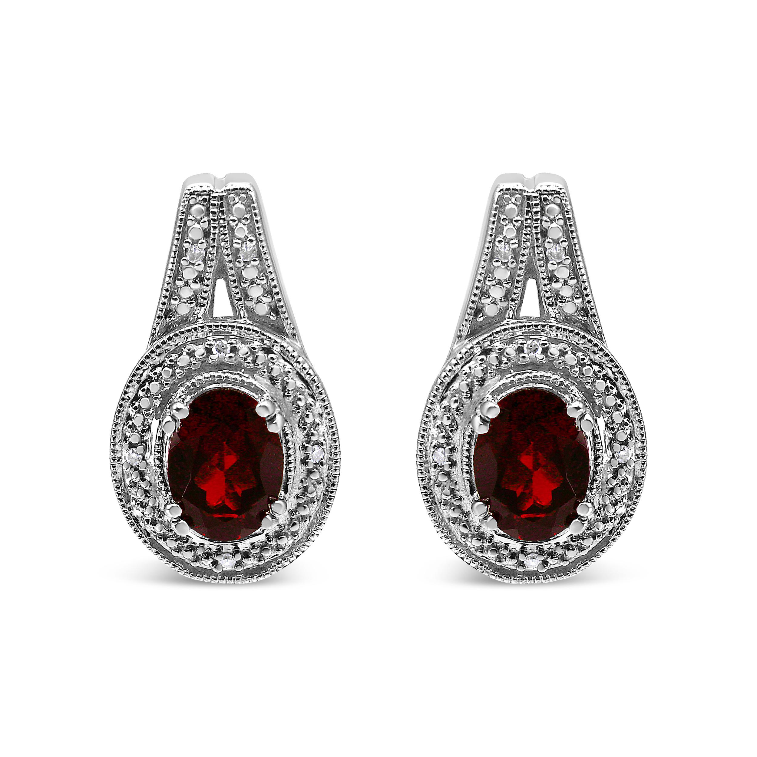 .925 Sterling Silver Diamond Accent and 8x6mm Red Oval Garnet Stud Earrings For Sale