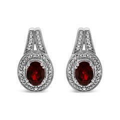 Boucles d'oreilles en argent 925 avec pendentifs en diamant et grenat ovale de 8x6 mm.