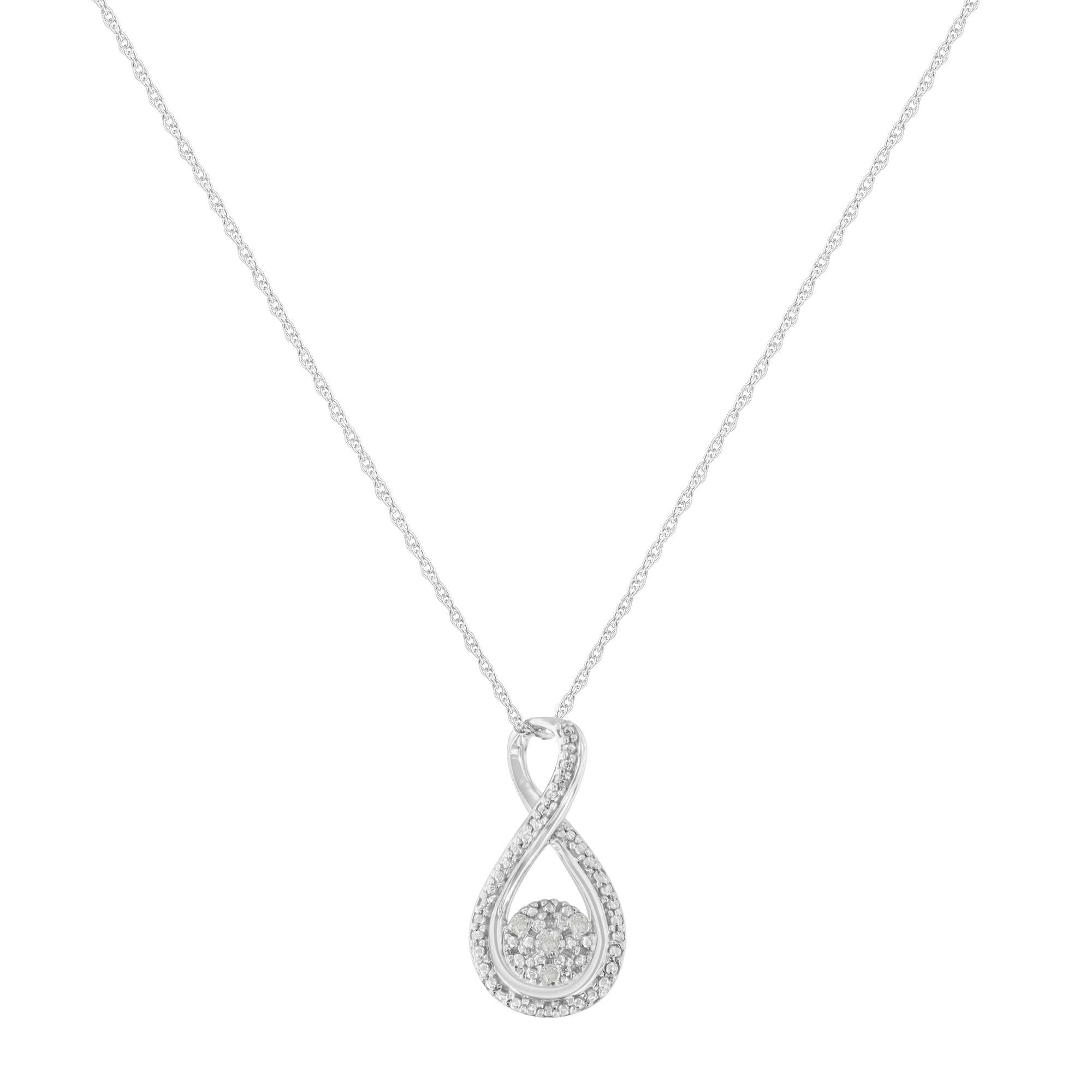 Celebrate someone you love with this stunning diamond infinity pendant necklace. This diamond necklace features an infinity swirl suspending a silver cluster studded with round, rose-cut, promo quality diamonds, which are milky and cloudy in nature.