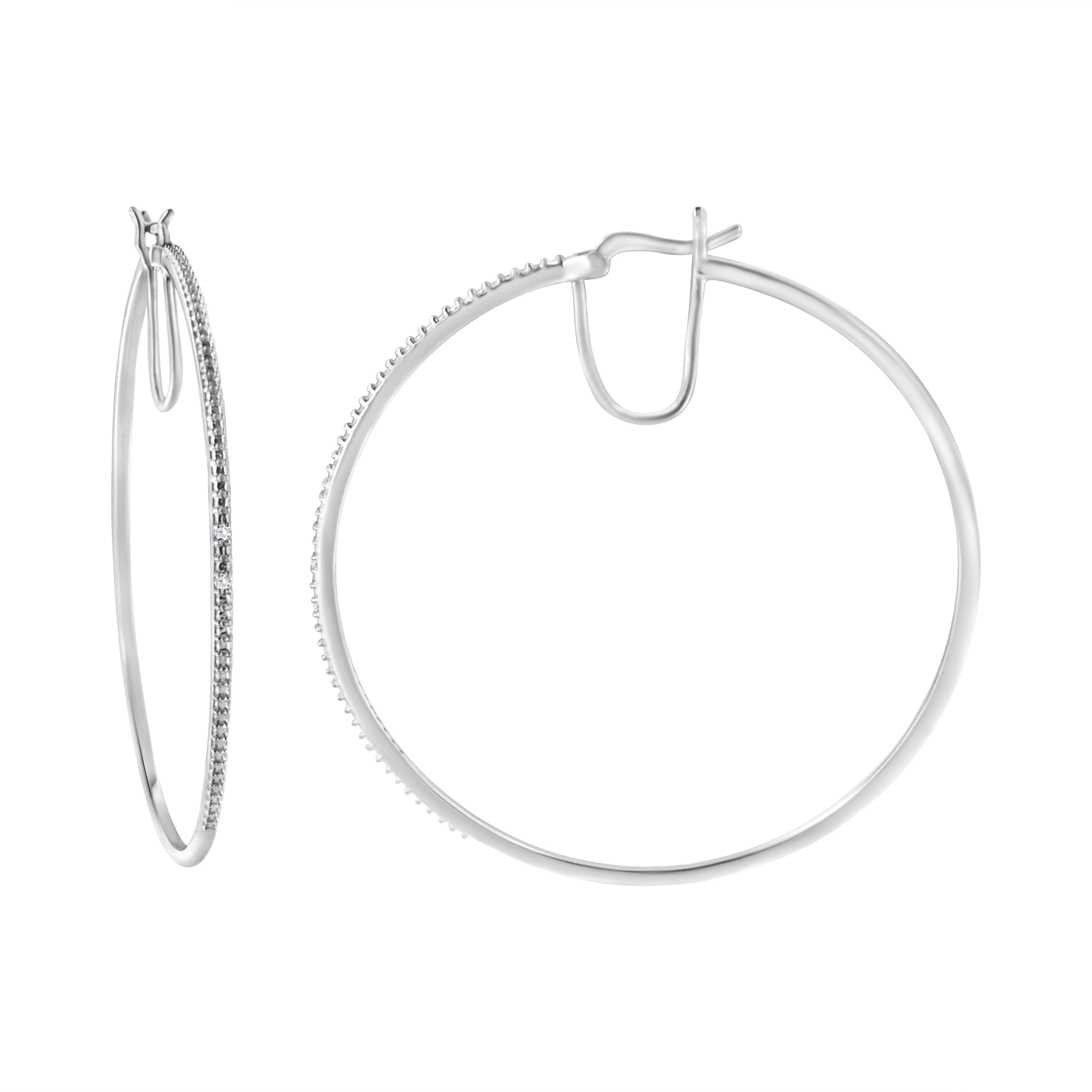 The fabulously sleek style of these sterling silver hoop earrings will complete any outfit and add the perfect amount of sparkle to your day. With a dazzling diamond accent comprised of 4 natural, sparkling diamonds, this diamond hoop design gives