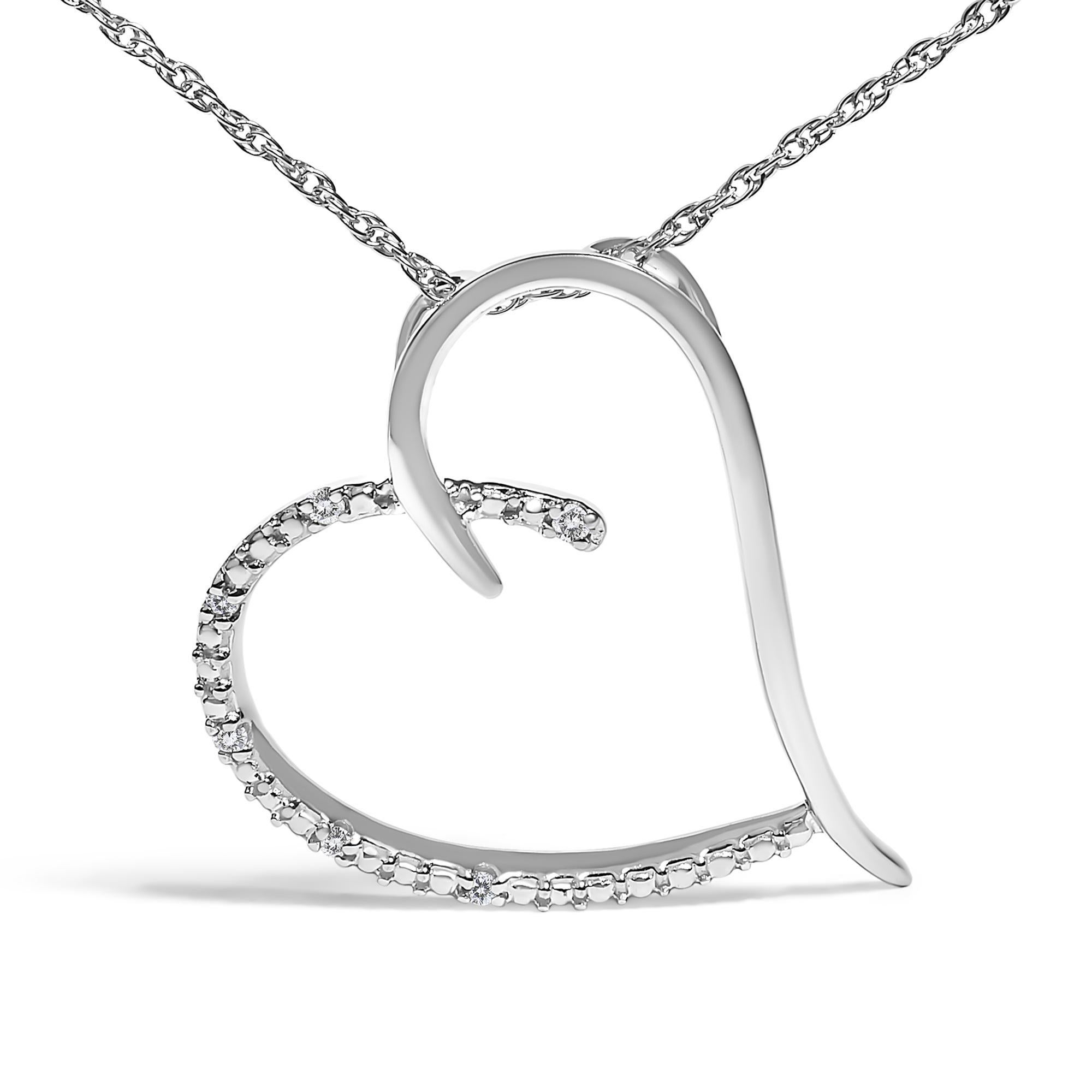 Encapsulate your sentiments with the exquisite delicacy of this .925 sterling silver diamond accent open heart slide pendant necklace. Gently ensconced within the tender embrace of its open heart design lies a sparkling constellation of six natural