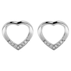 Boucles d'oreilles cœur ouvert en argent sterling .925 serties de diamants