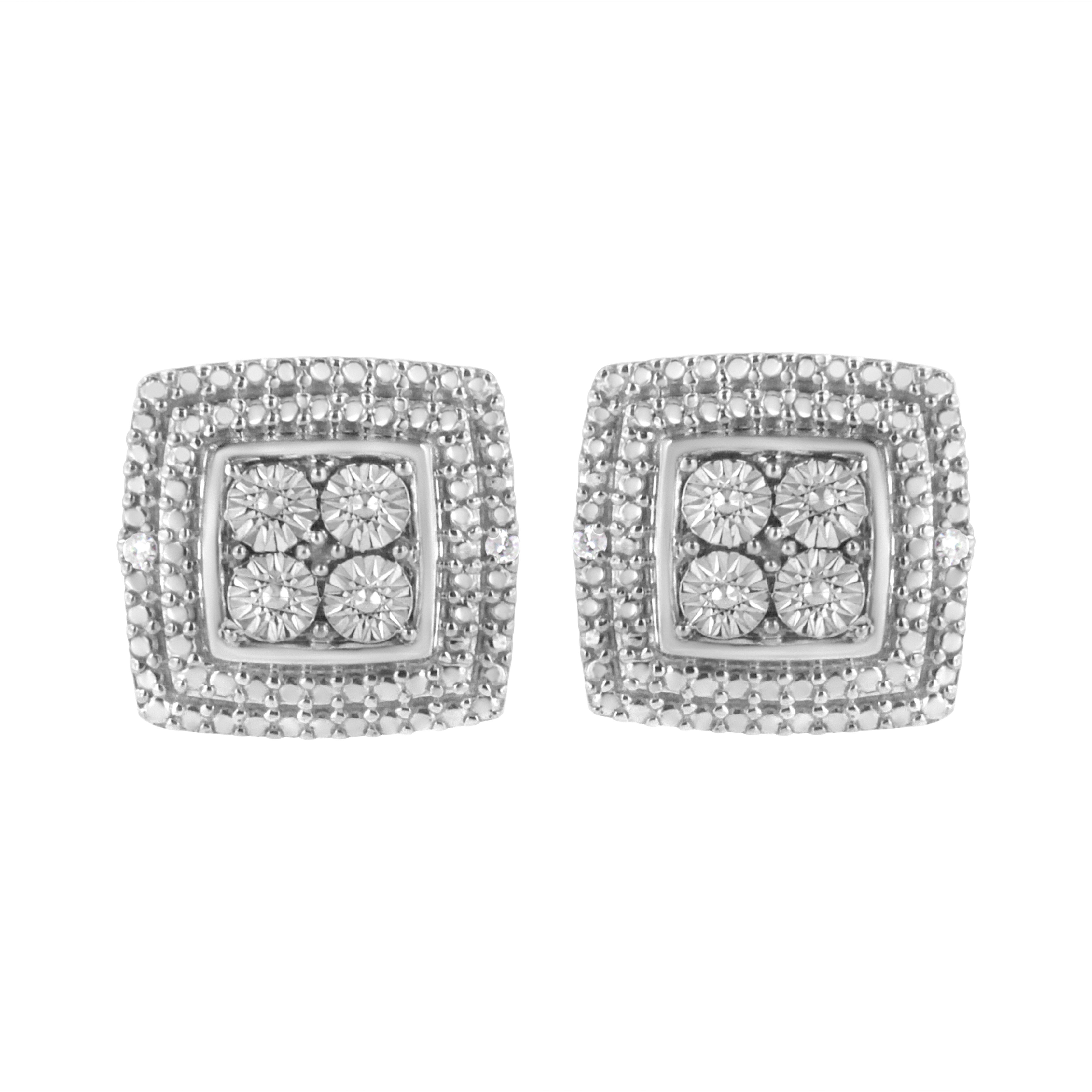 This gorgeous pair of square shaped studs are crafted in the finest .925 sterling silver. Featuring two diamonds each on the outer edges of each stud, this piece has a unique design of beaded and smooth sterling silver. This unique piece comes with