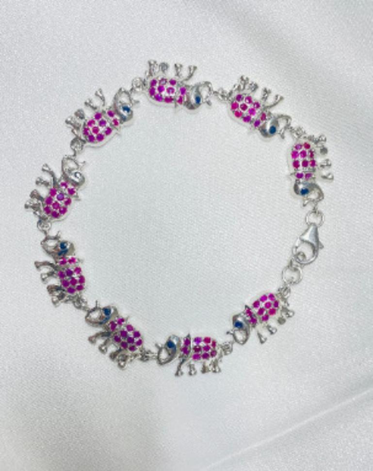 925 Sterling Silver Elephant Charm Bracelet with Ruby and Sapphire for Her In New Condition For Sale In Houston, TX